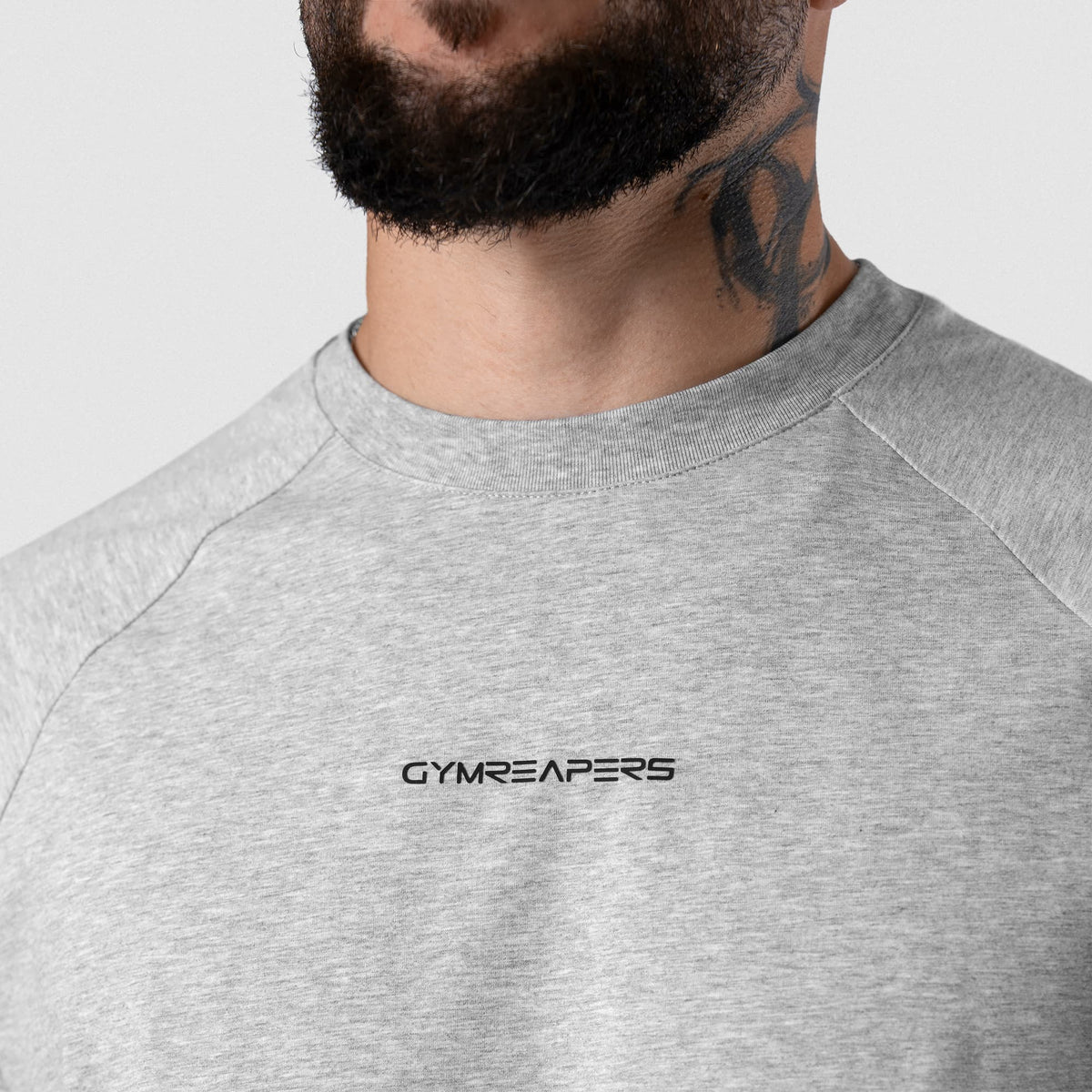 Axis Raglan Tee - Heather Gray neckline and chest logo detail