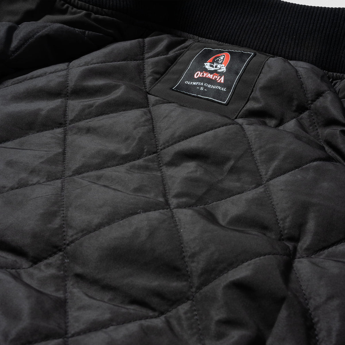 Champions Gold Crop Bomber Jacket | Internal quilted lining in black feature