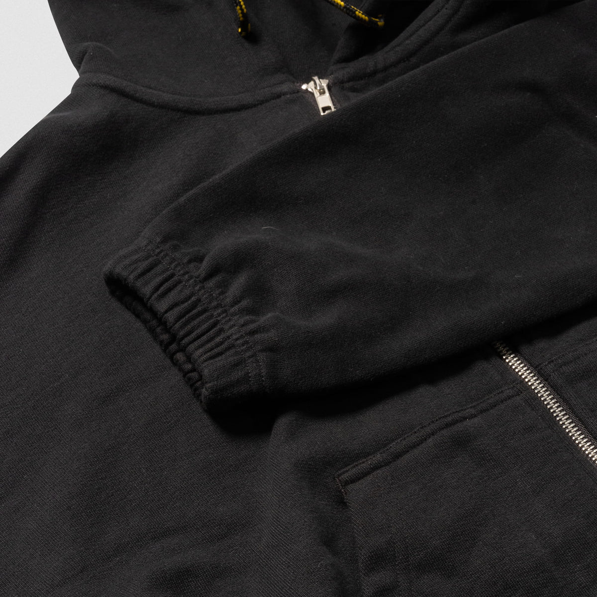 Champions Gold Cropped Zip-Up Hoodie | Close up of elasticated cuffs feature