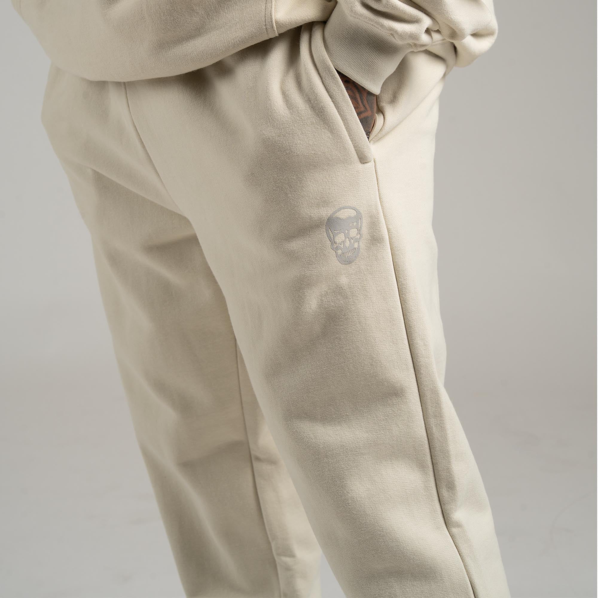 Athlete wearing Bone heavyweight jogger close up shot of logo