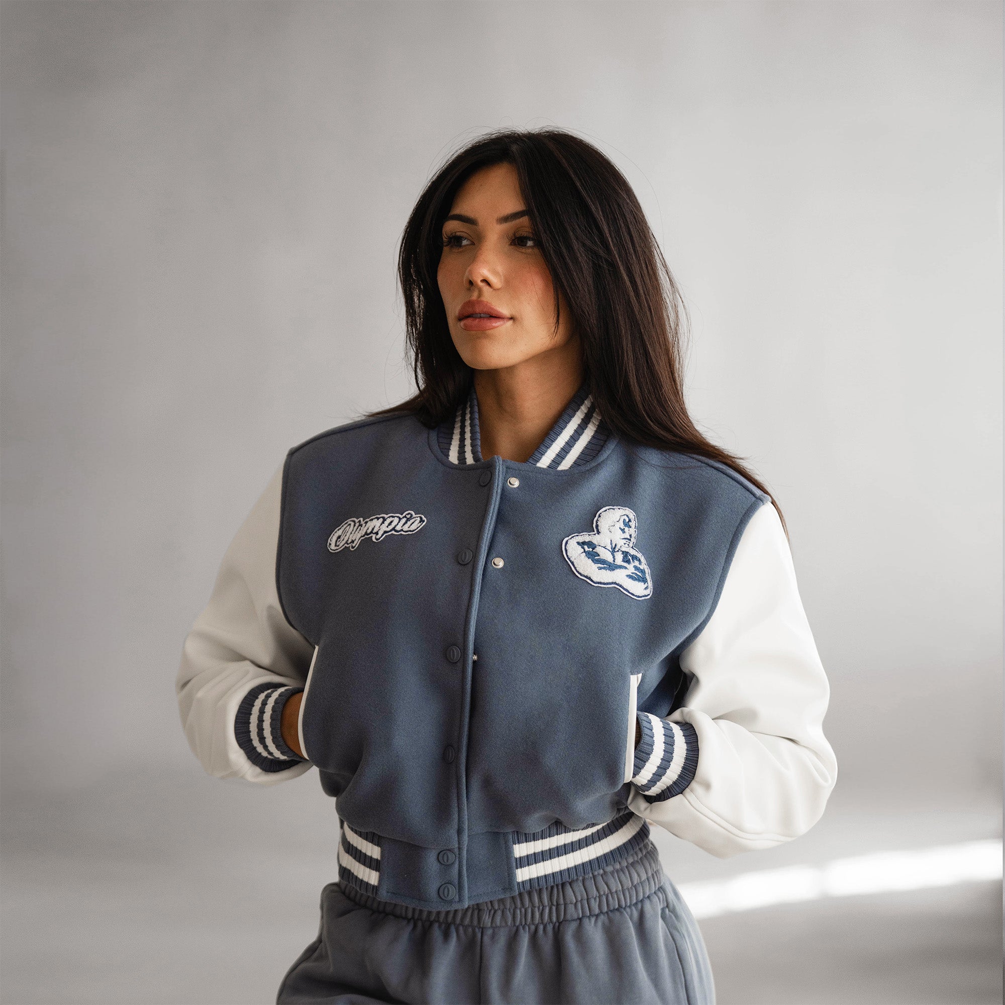 cropped varsity jacket on athlete