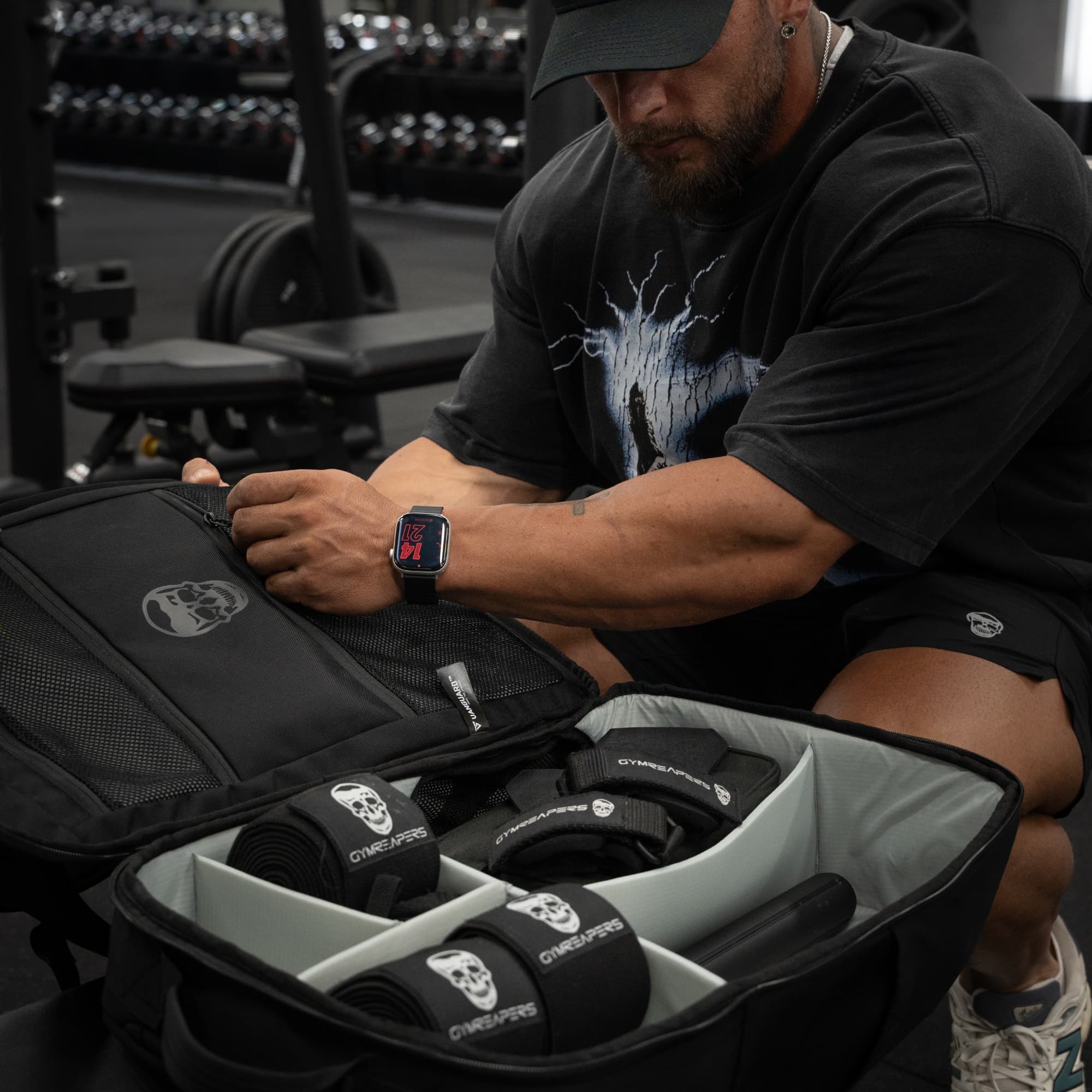 athlete putting lifting gear back into vanguard backpack
