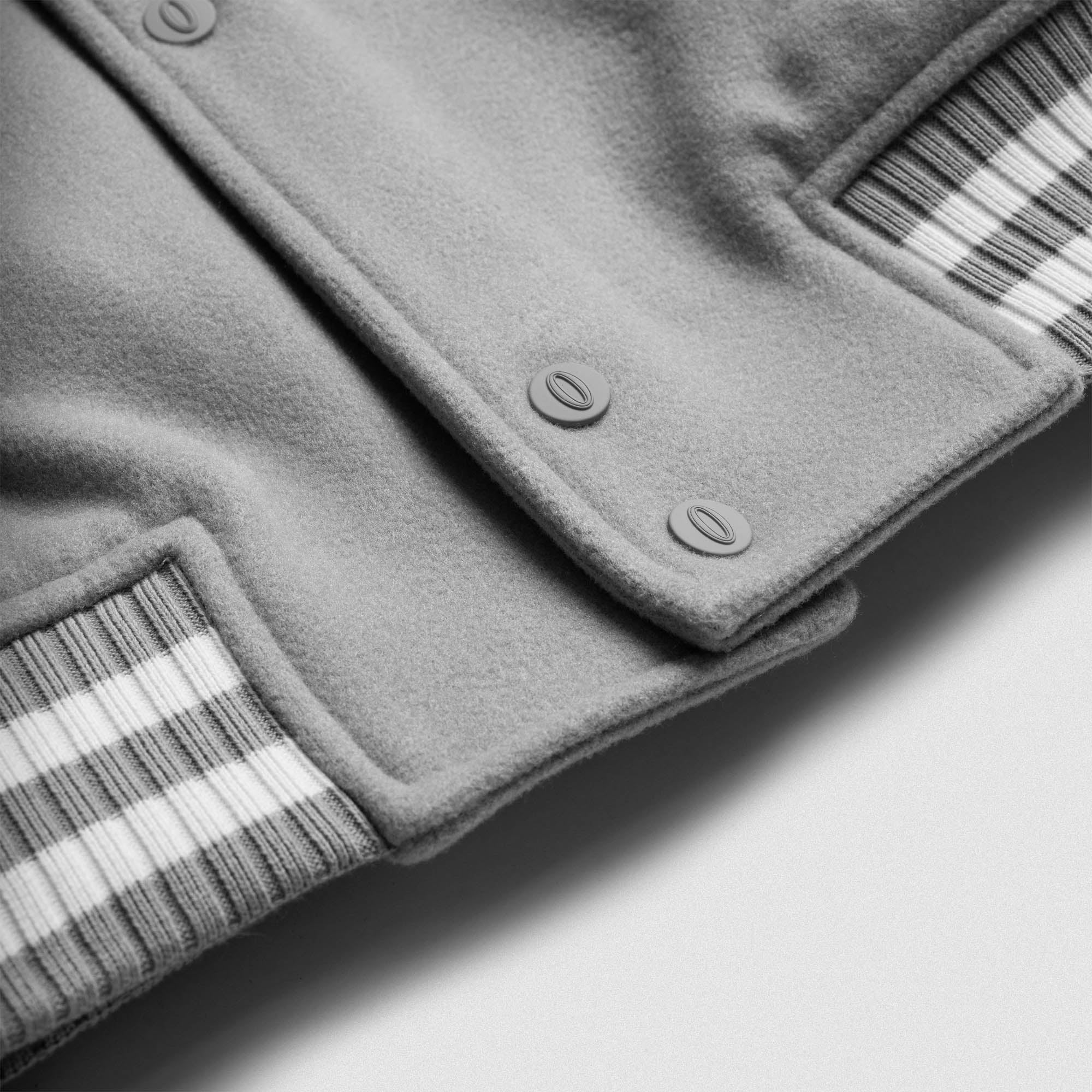 Olympia Lifting Club Varsity Jacket close up of button details