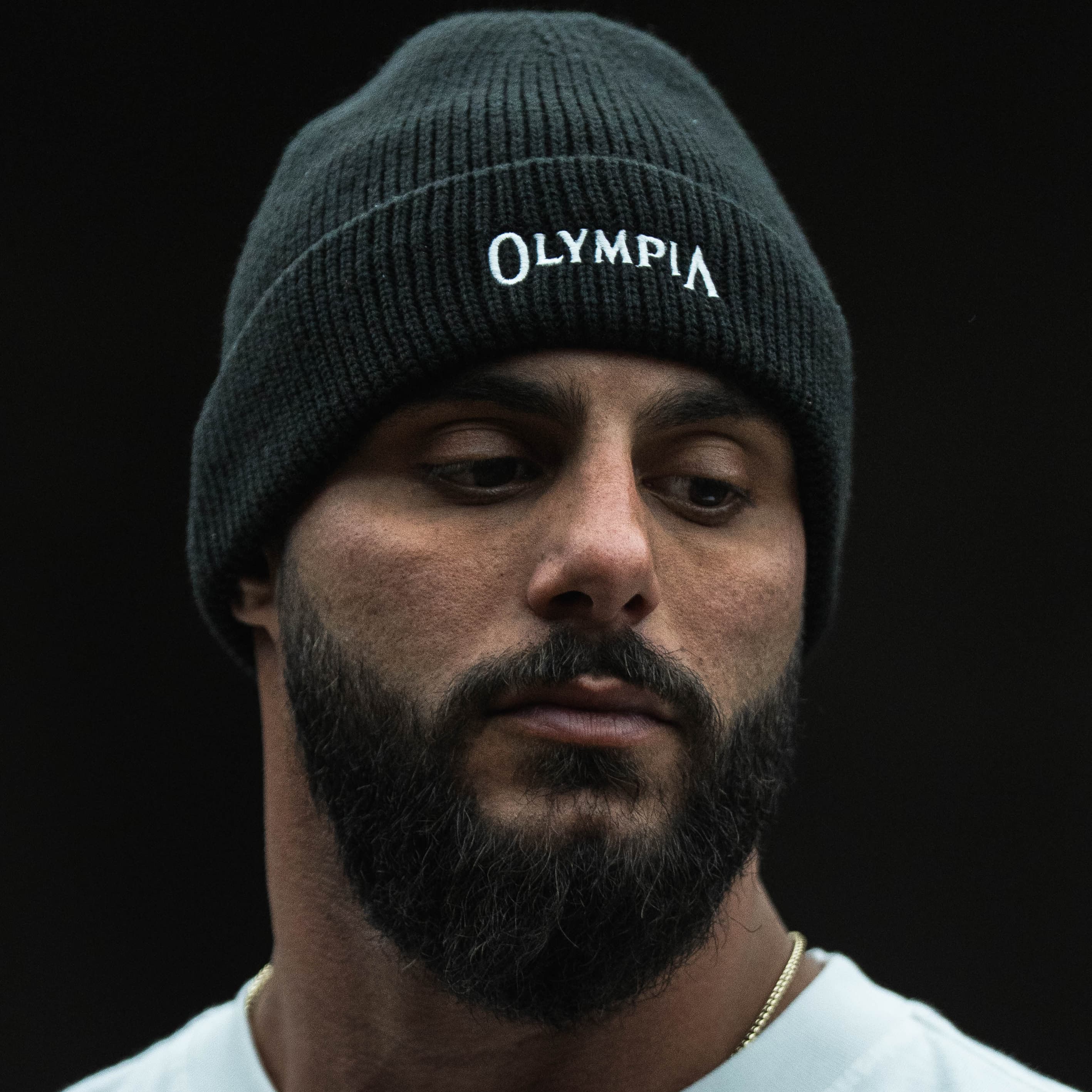 Olympia Ribbed Knit Beanie on athlete close up shot