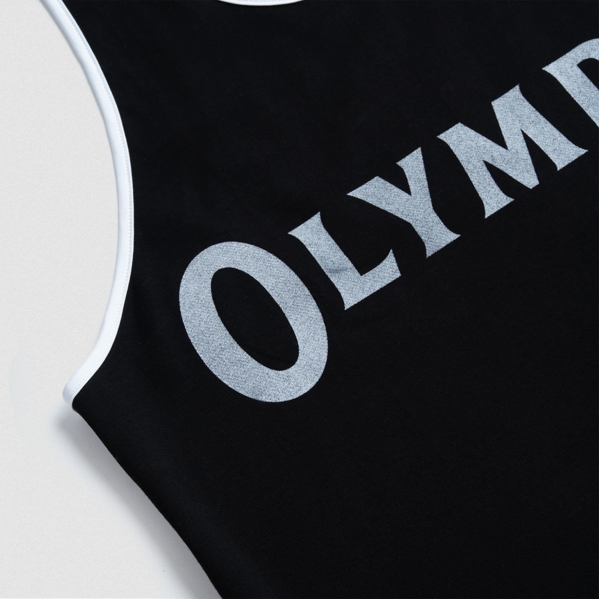 olympia bound edge stringer lay flat close up of graphic