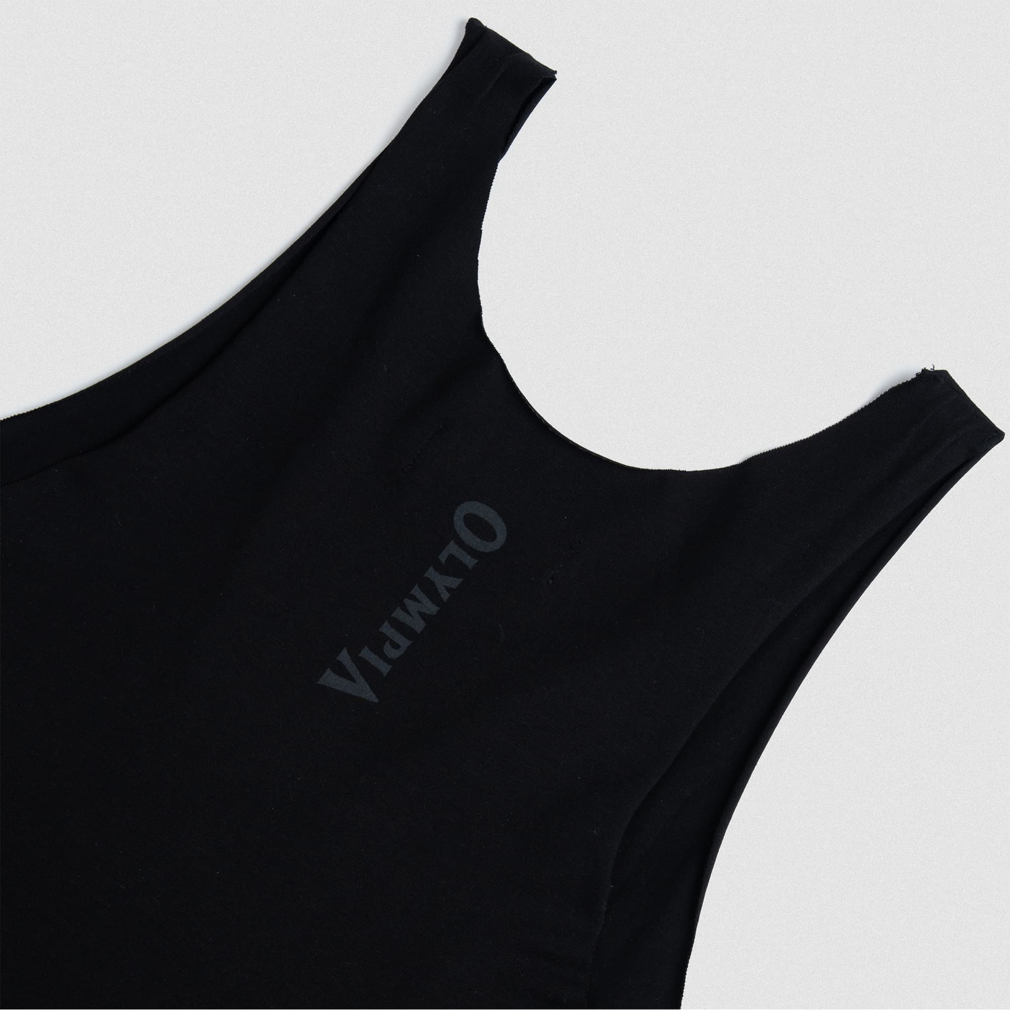 olympia raw hem stringer lay flat close up on back graphic