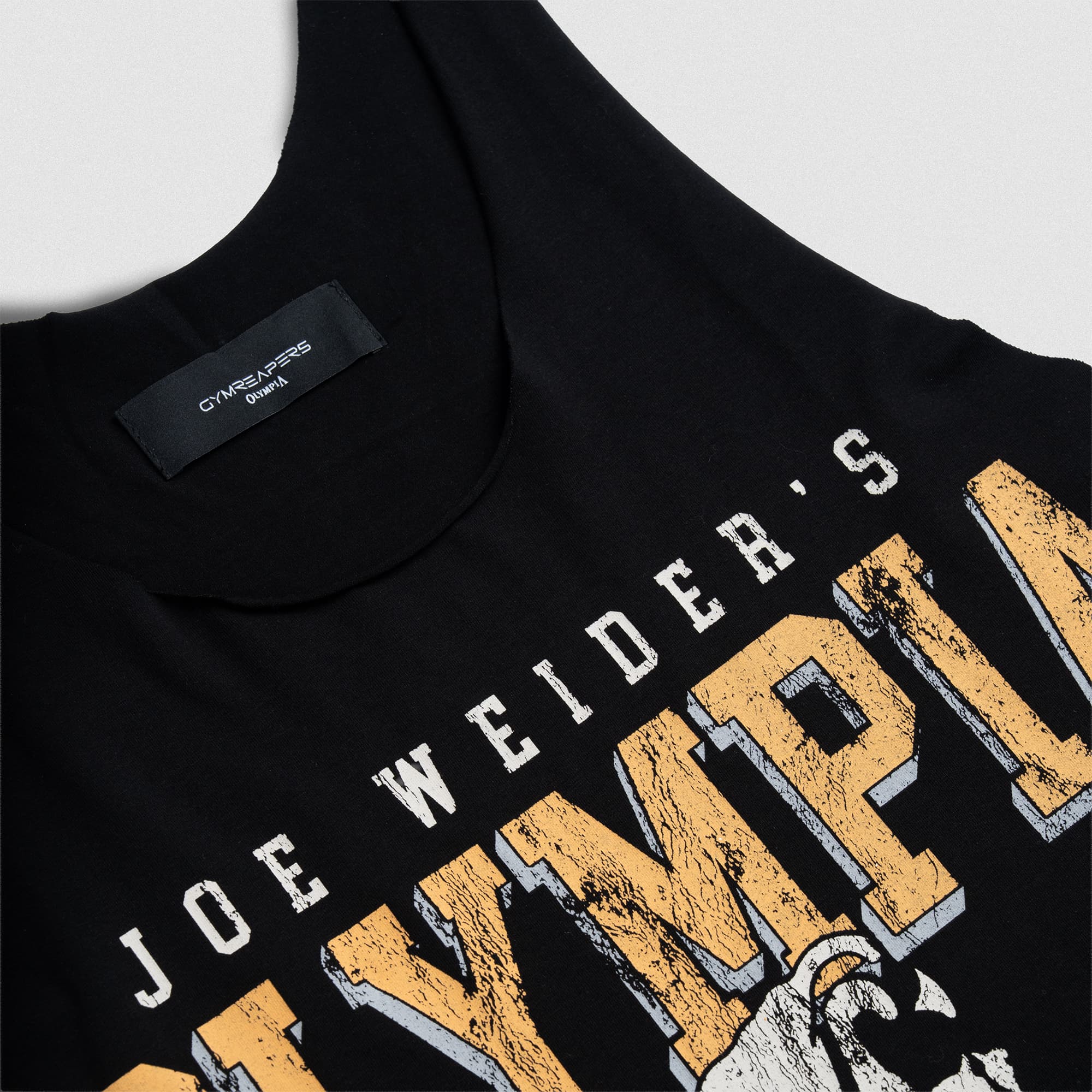 Close up lay flat shot of Olympia training stringer showcasing graphic and tag