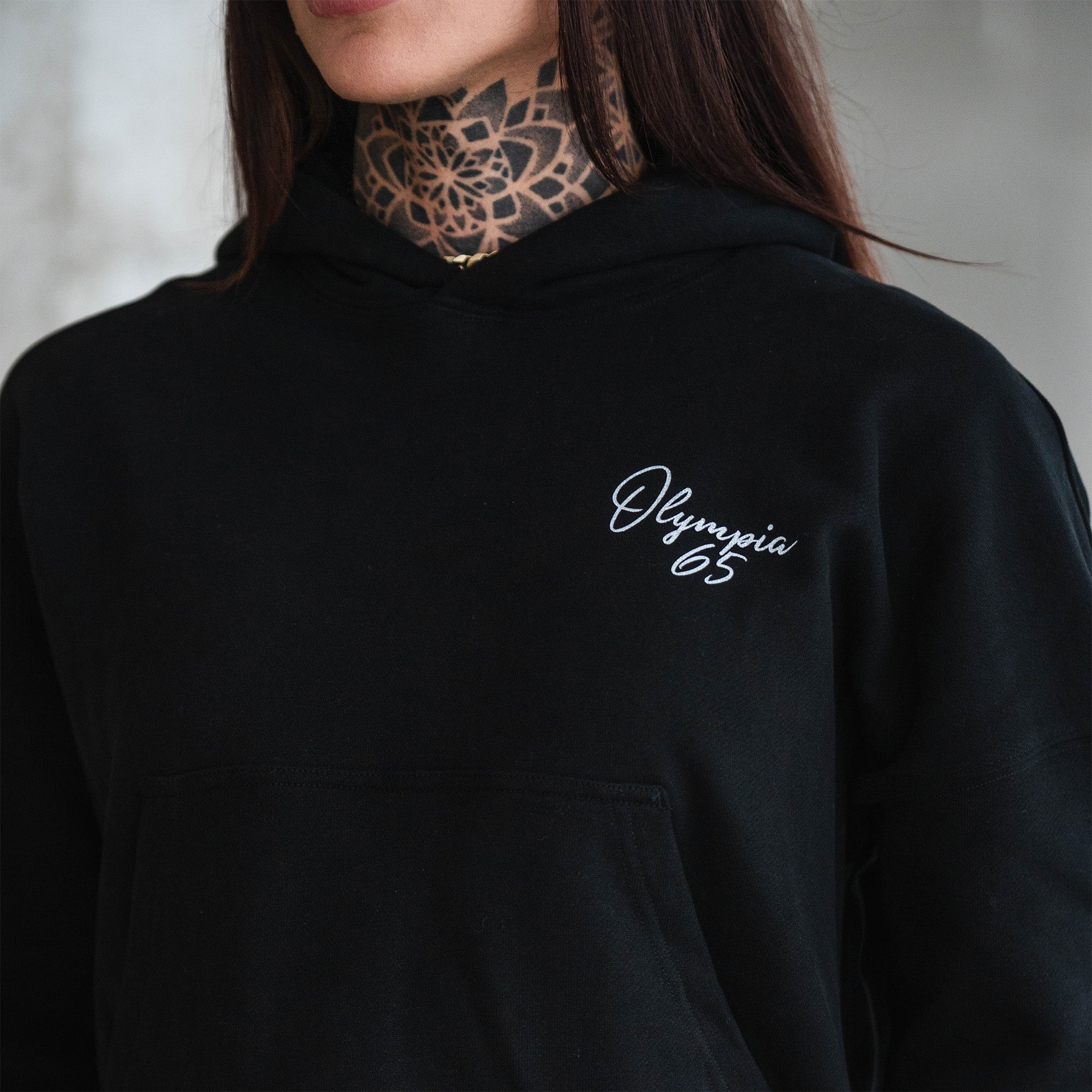 Olympia Script Cropped Hoodie close up on logo