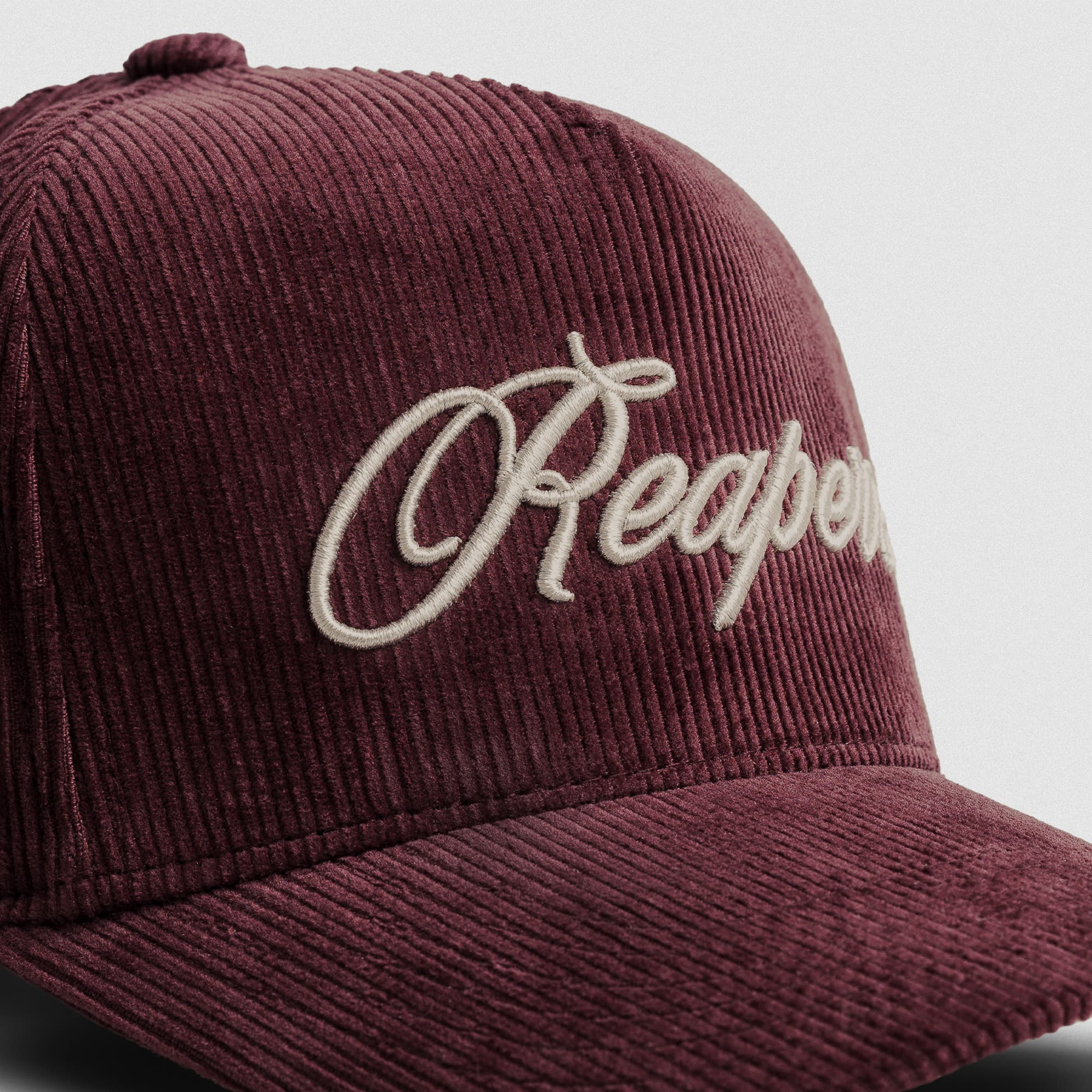 Corduroy Reapers 5-Panel Hat - Velvet/Tan close up shot of logo