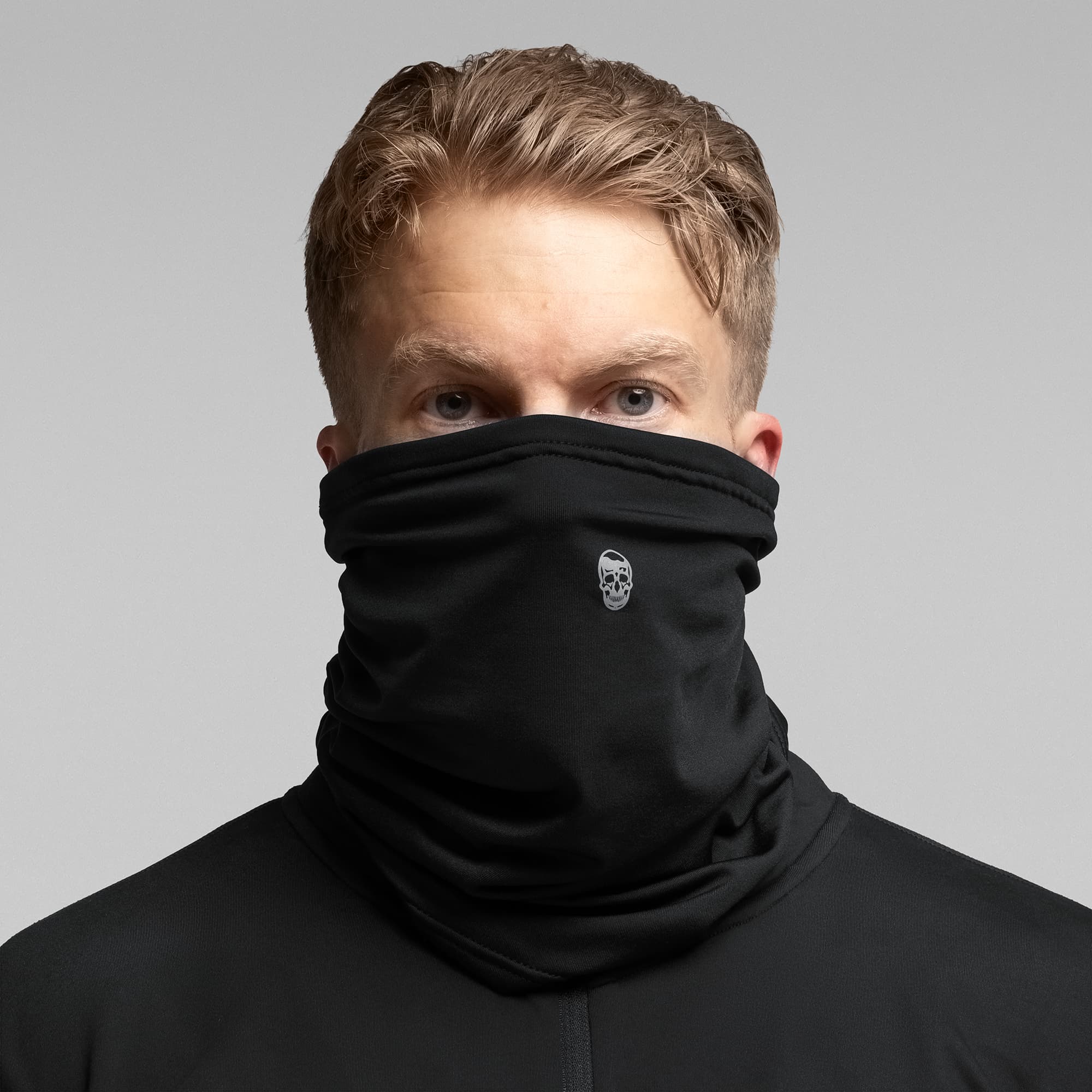 Athlete wearing the Stryda™ Snood half face covered