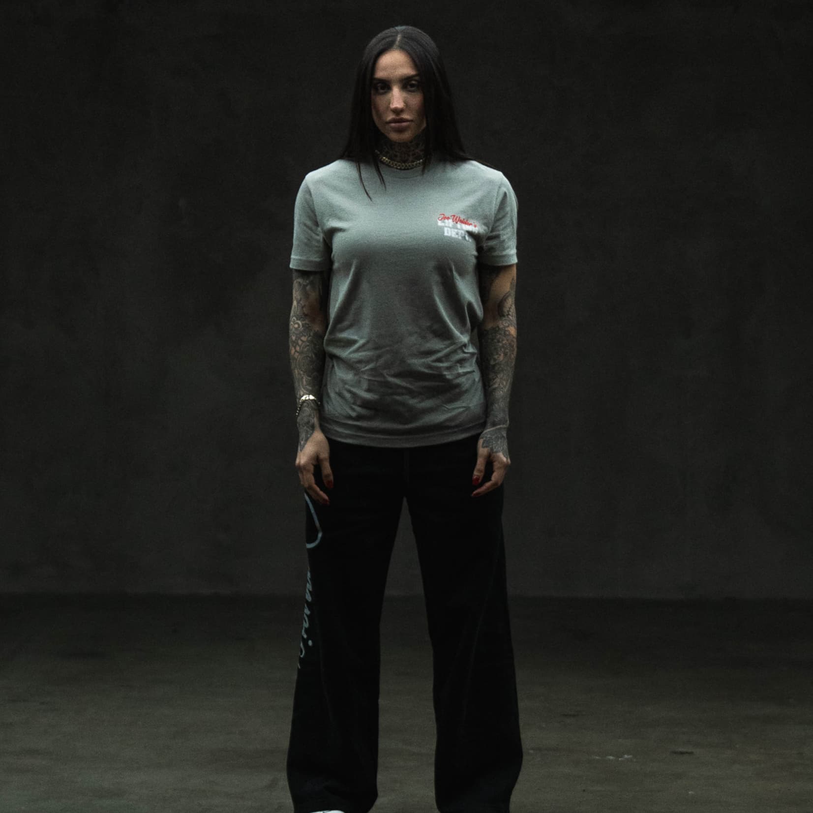 full body lifestyle shot of athlete wearing the lifting department tee showing front graphic