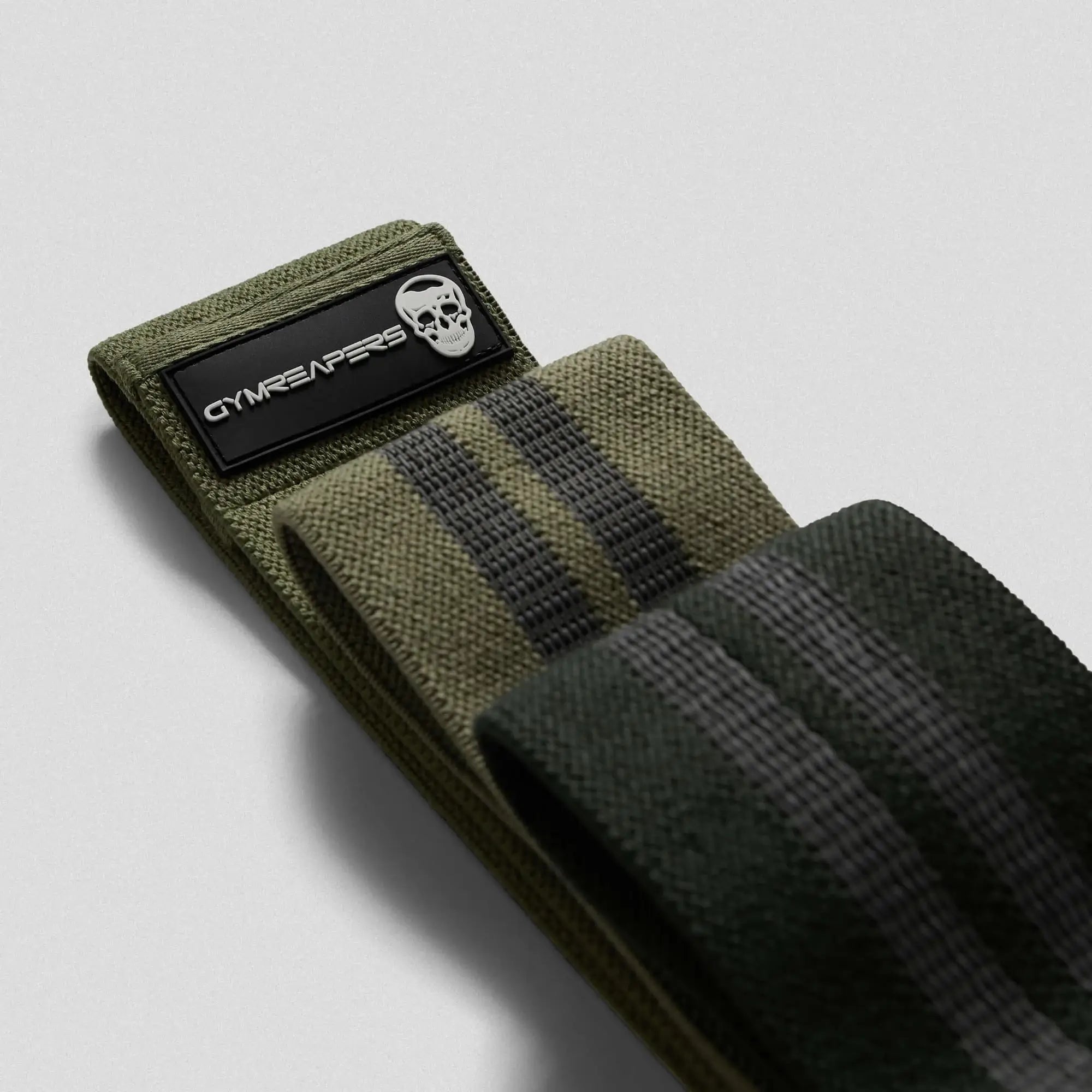 photo of 3 pack military green hip bands stacked on gray background