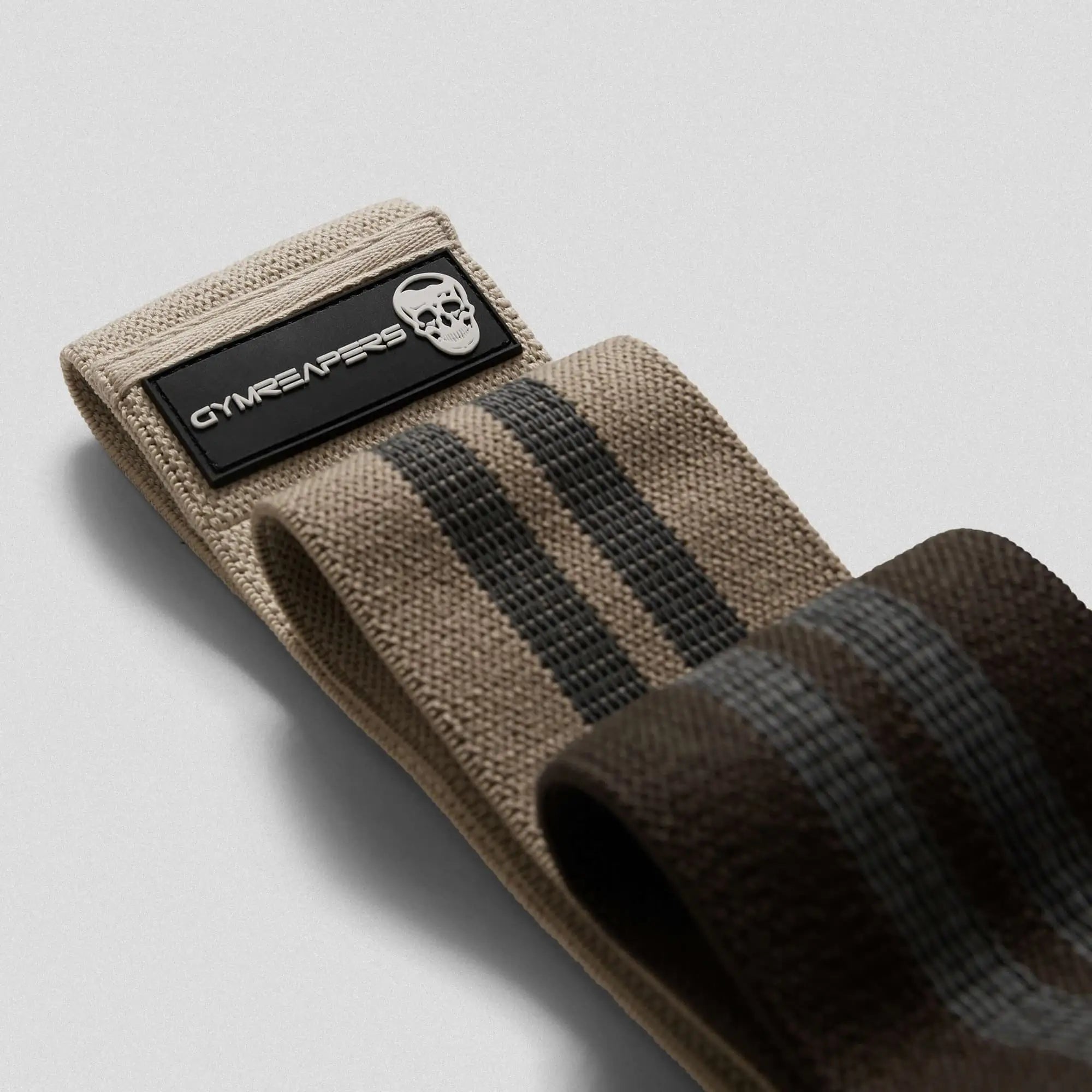 close up photo of nude hip bands 3 pack stacked on gray background
