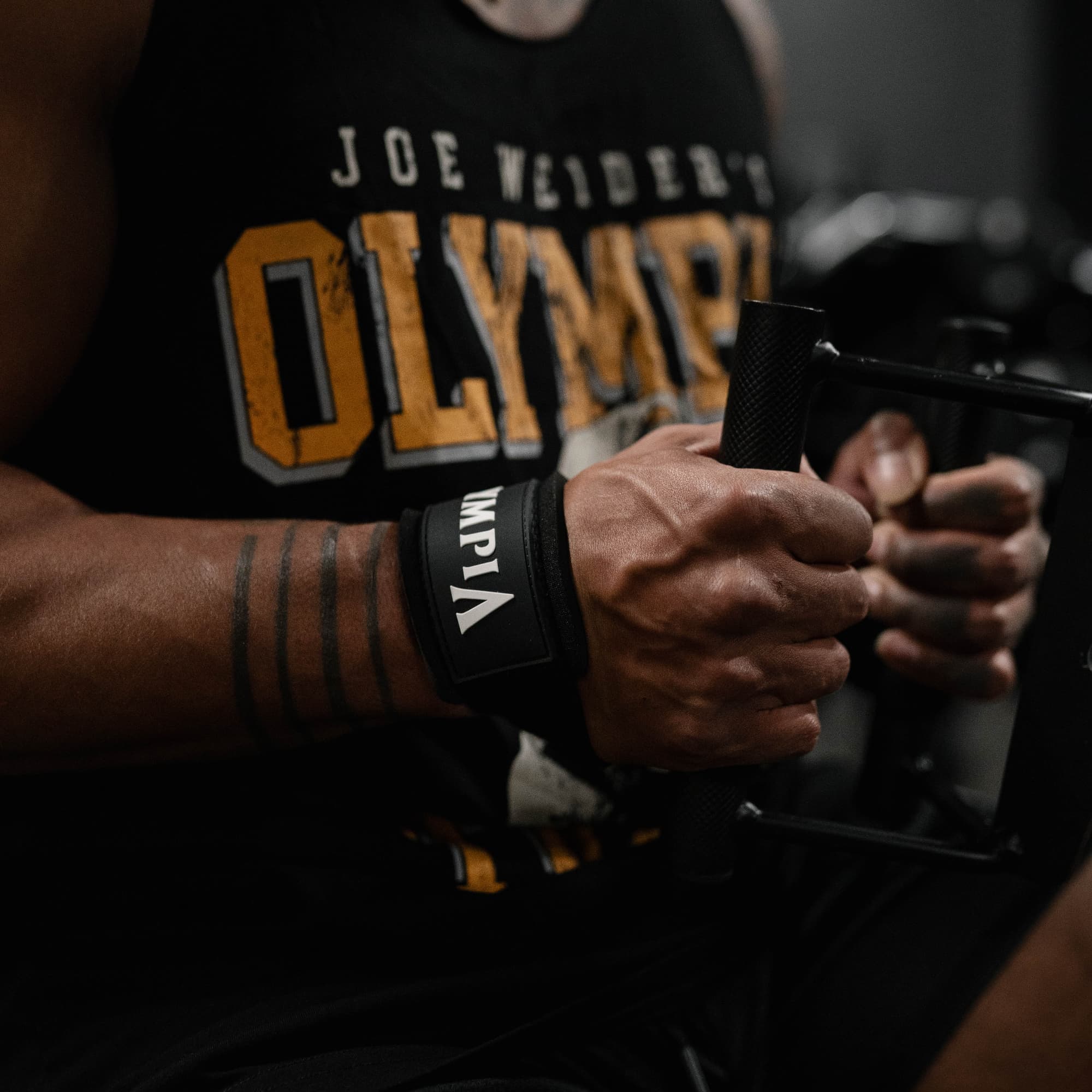 Athlete wearing Olympia Lifting Straps during lift