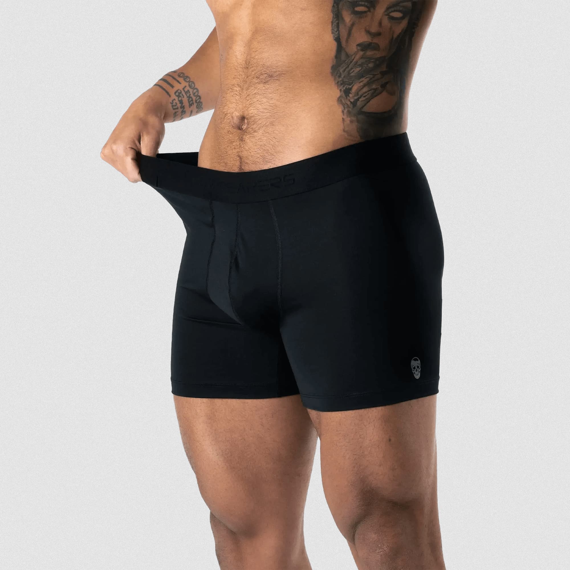athlete wearing momentum boxer briefs showing the stretchy waistband