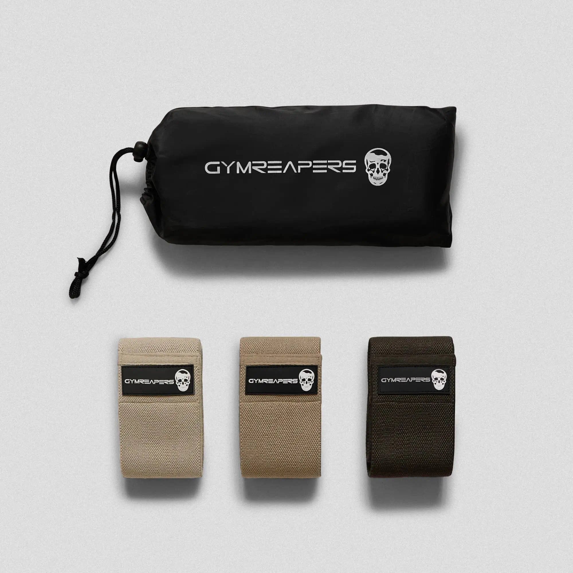 photo of nude hip bands 3 pack with carry bag on gray background