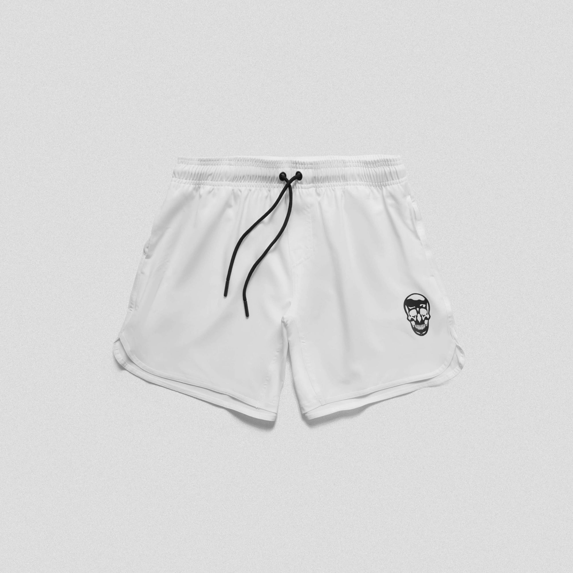 white training shorts front flat lay min
