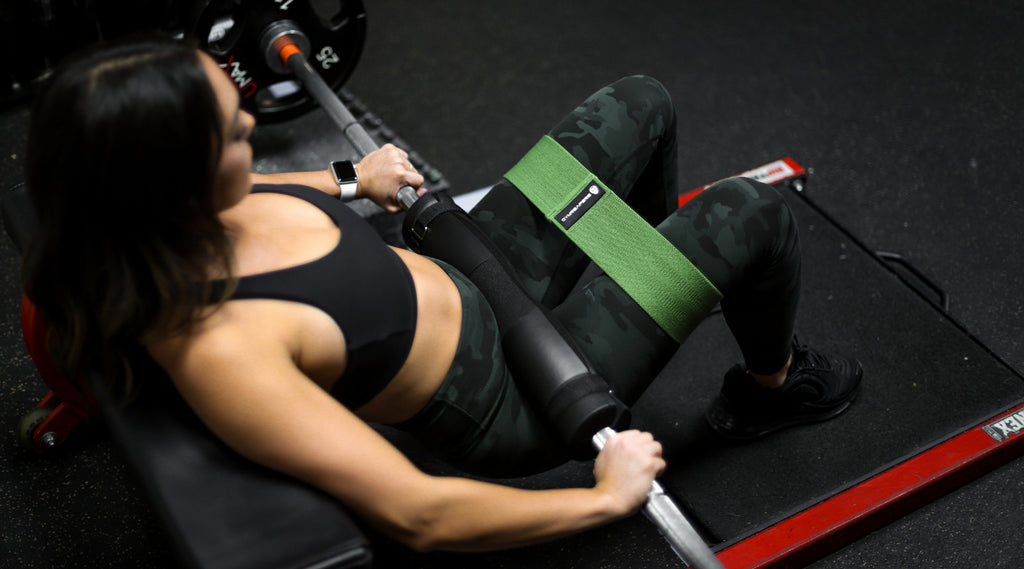 Kneeling Hip Thrust With Band - Muscle & Fitness