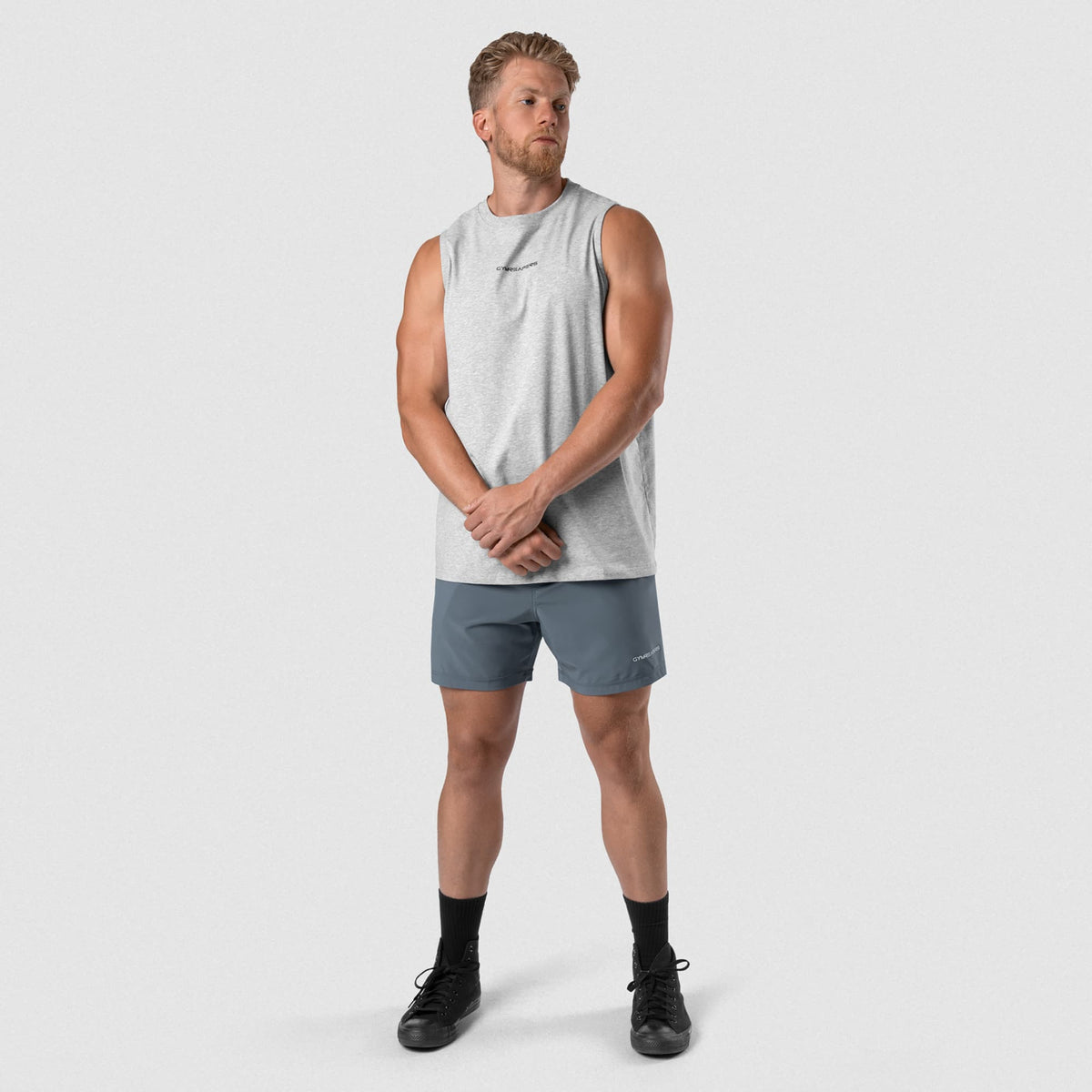 Man wearing Axis Muscle Tank - Heather Gray full-body front view