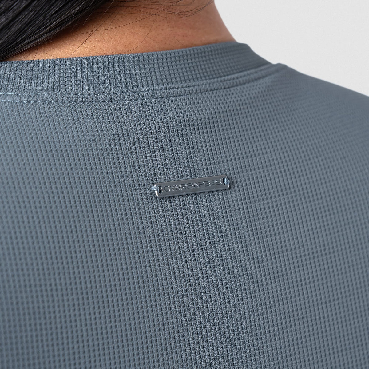 Axis Support Baby Tee - Lake back neckline and logo detail