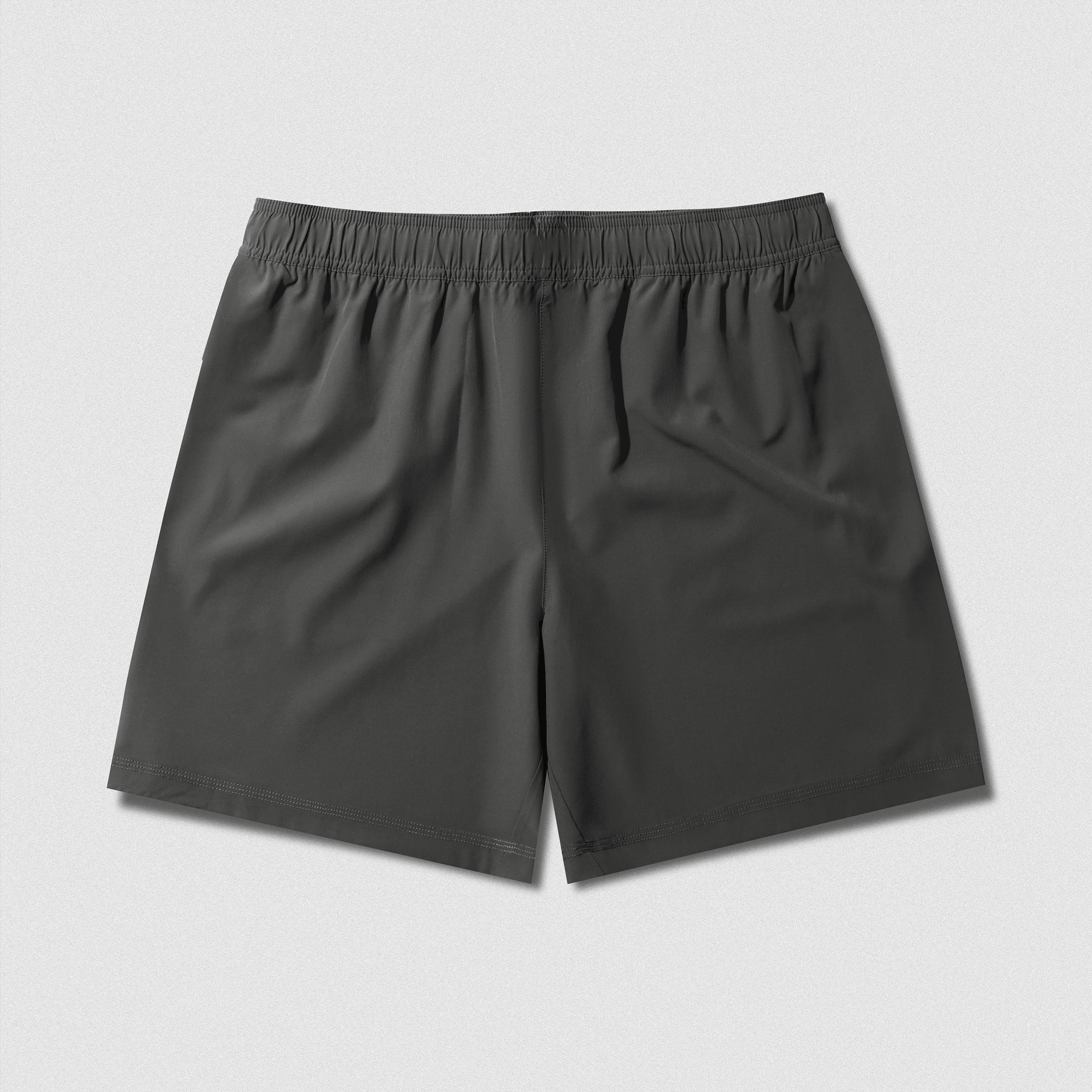 Back view of Men's Conquer 7 Inch Shorts - Dark Gray