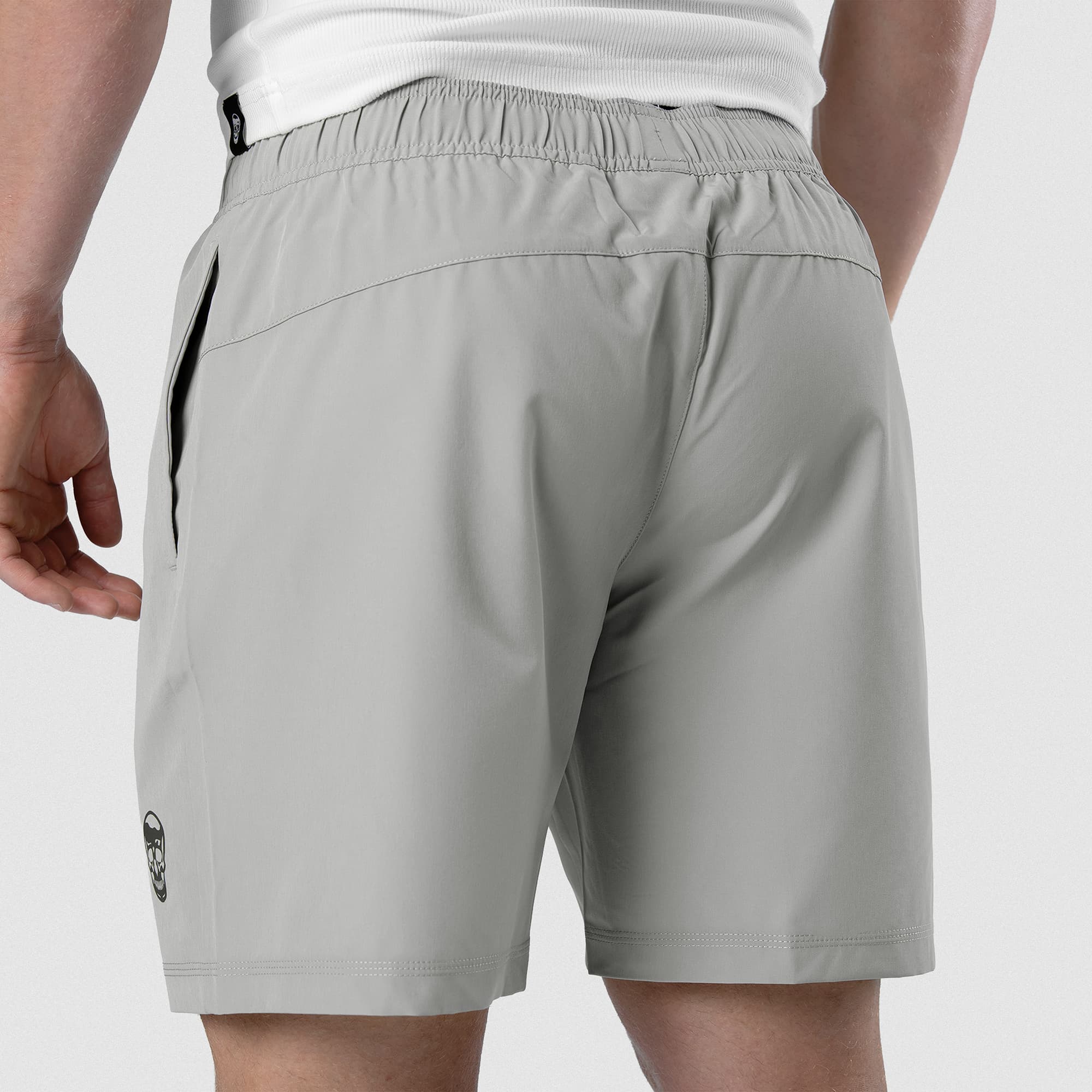 Back view of Men's Conquer 7 Inch Shorts on model - Gray