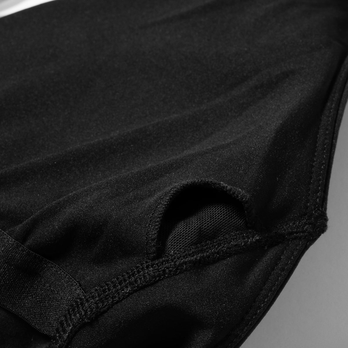 Close up view of the removable pad spot in the chest of the Olympia Bodysuit