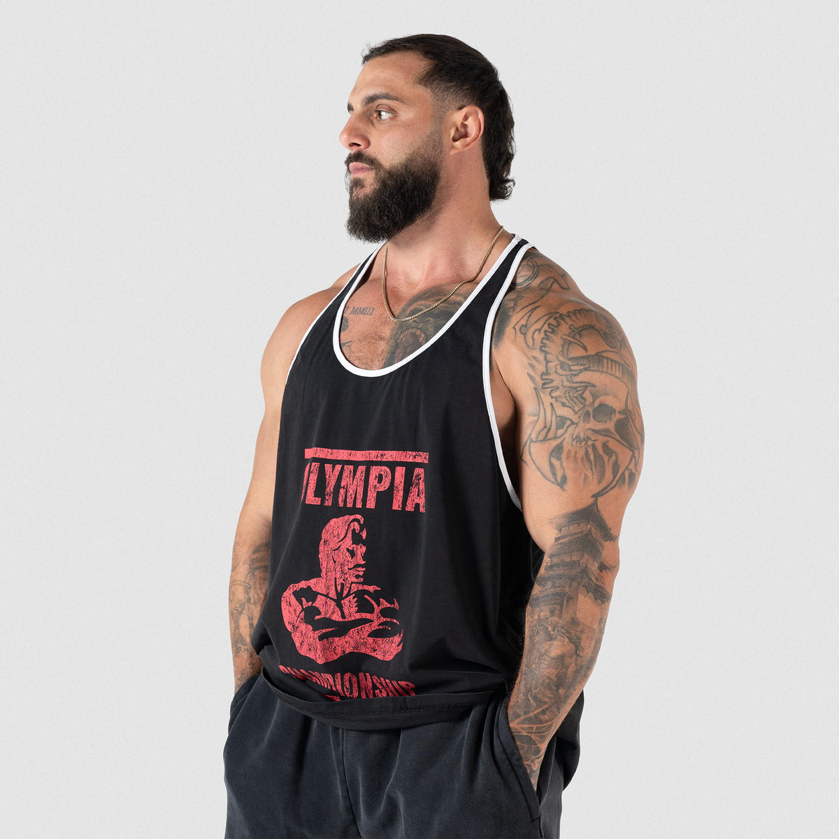 Male model wearing the black Championship Stringer tank top 