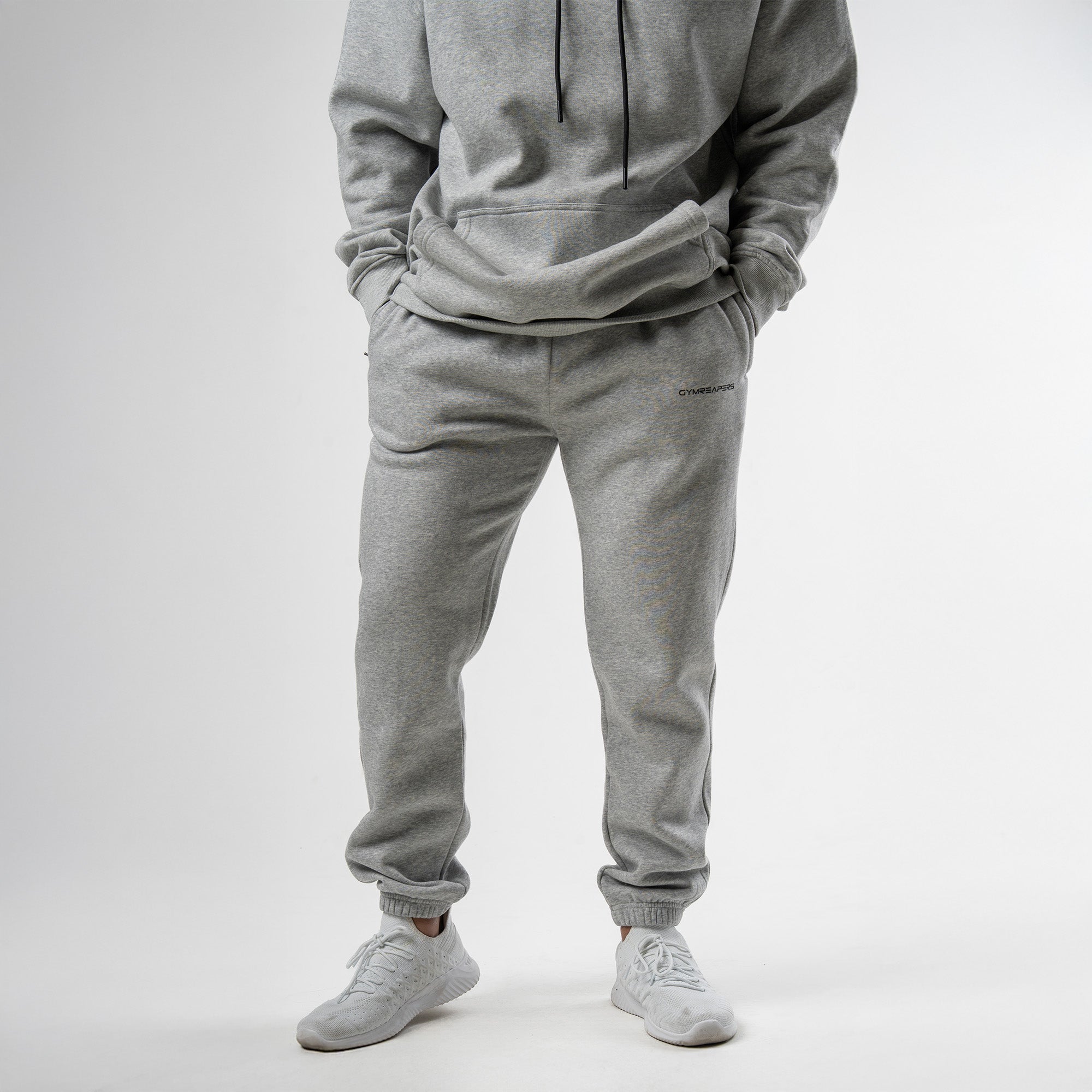 athlete wearing gray axis joggers front view