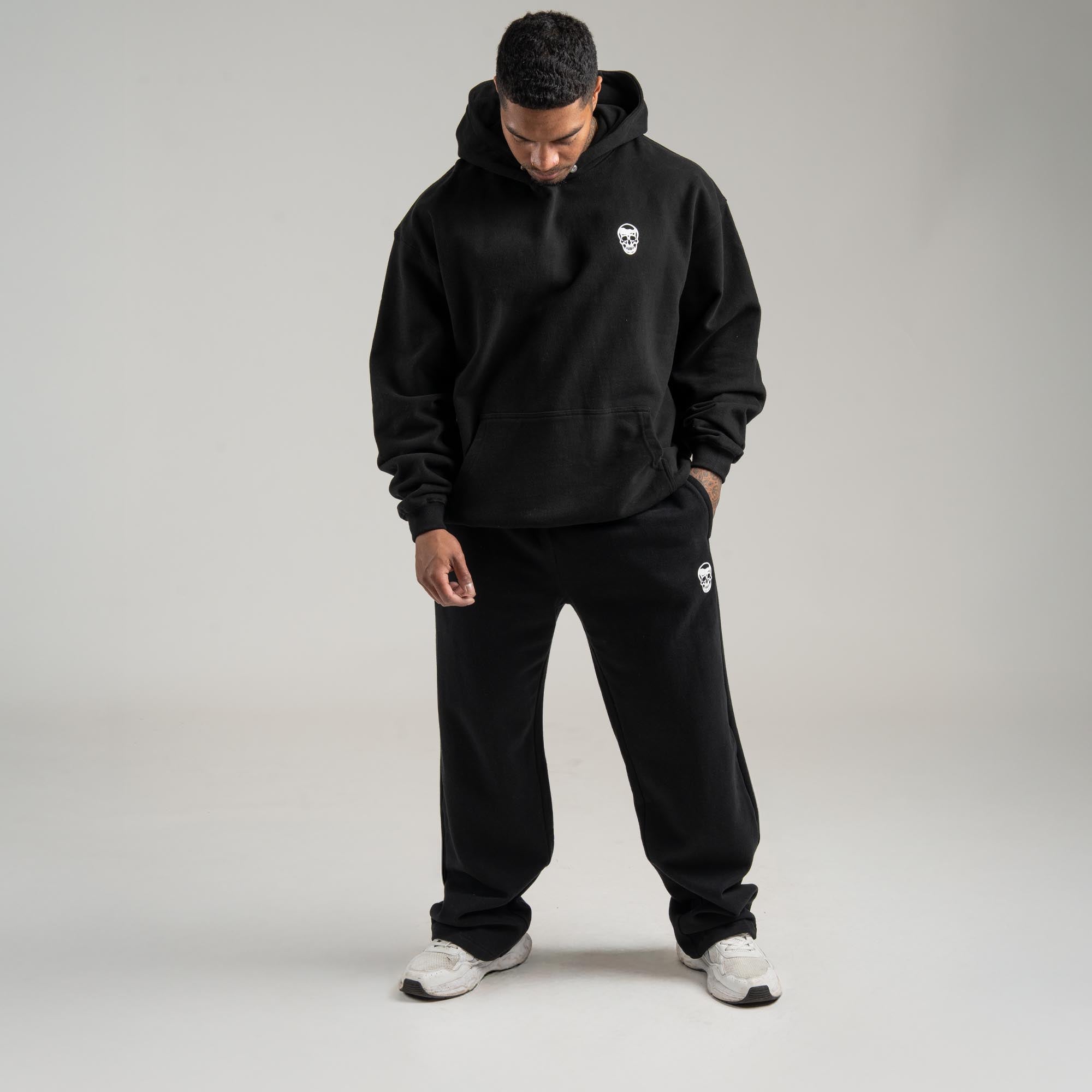 athlete wearing Black Heavyweight Hoodie full body shot
