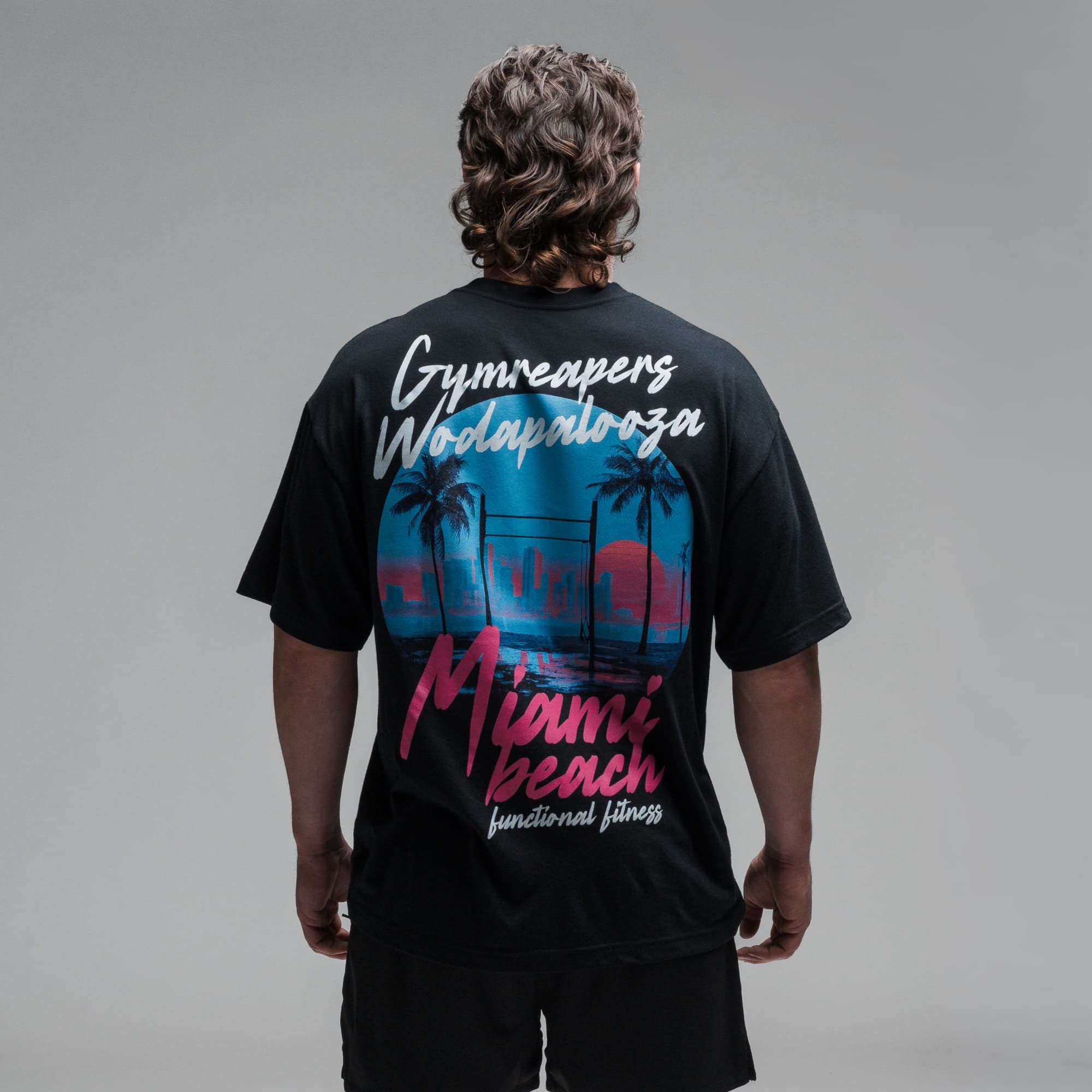 Athlete wearing the Skyline Tee half body shot back view