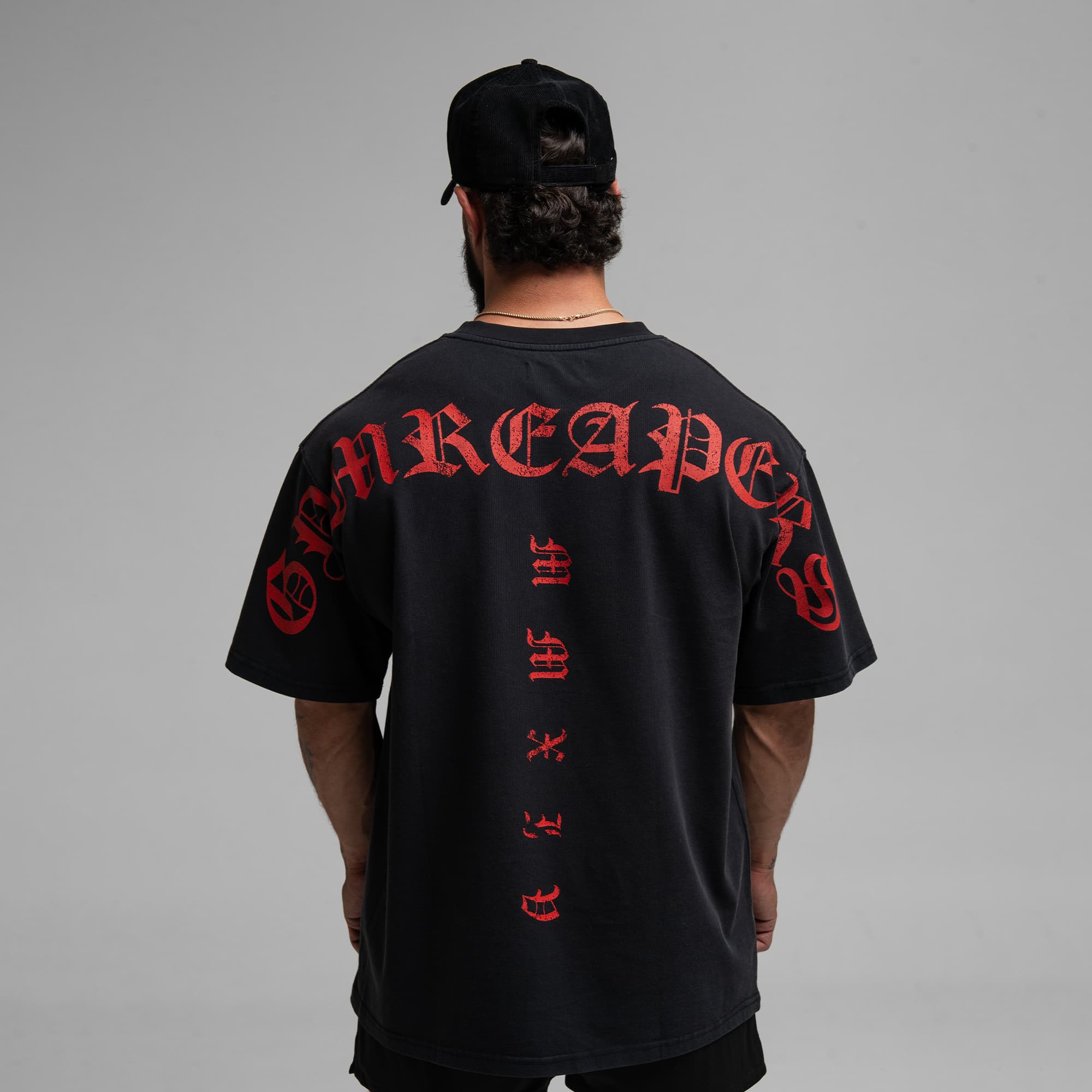 Athlete wearing the Loyalty Tee half body shot back view