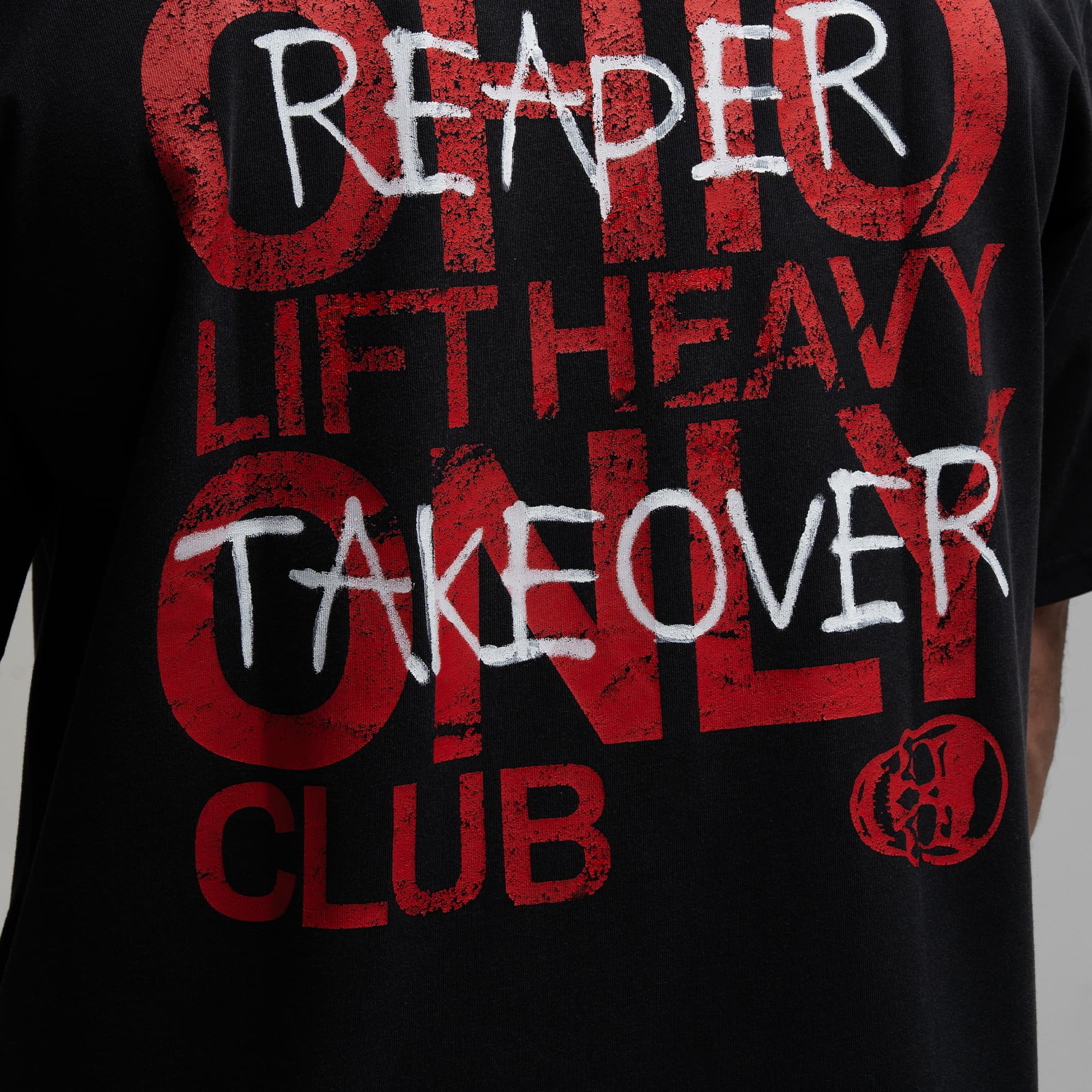 Athlete wearing the Takeover Club Tee close up shot of back graphic