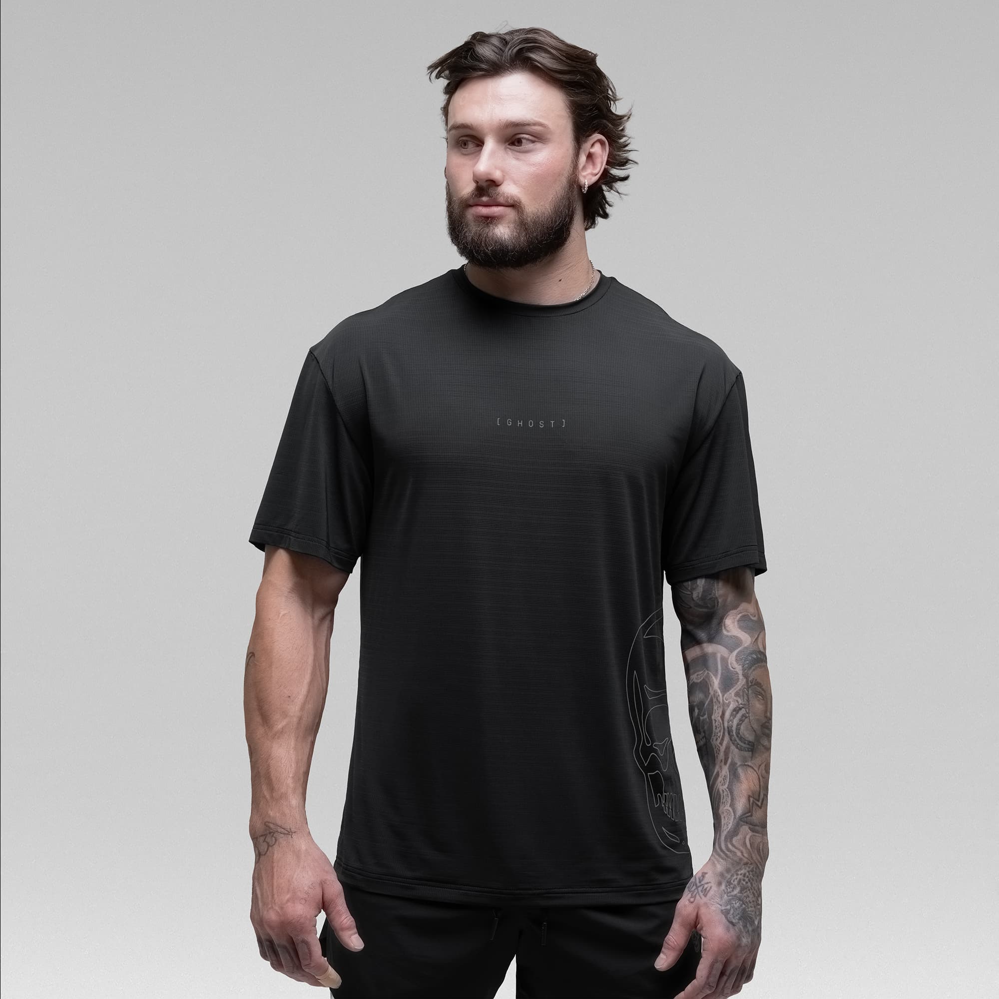 Athlete wearing the Ghost Oversized Tee half body shot front view