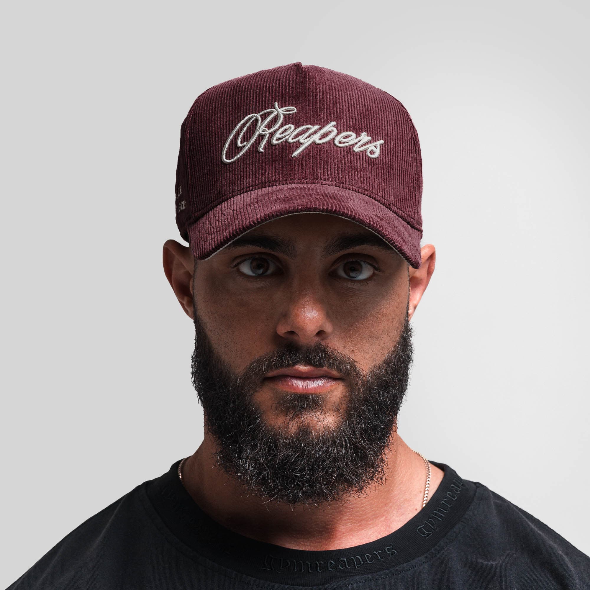 Athlete wearing Corduroy Reapers 5-Panel Hat - Velvet/Tan front view