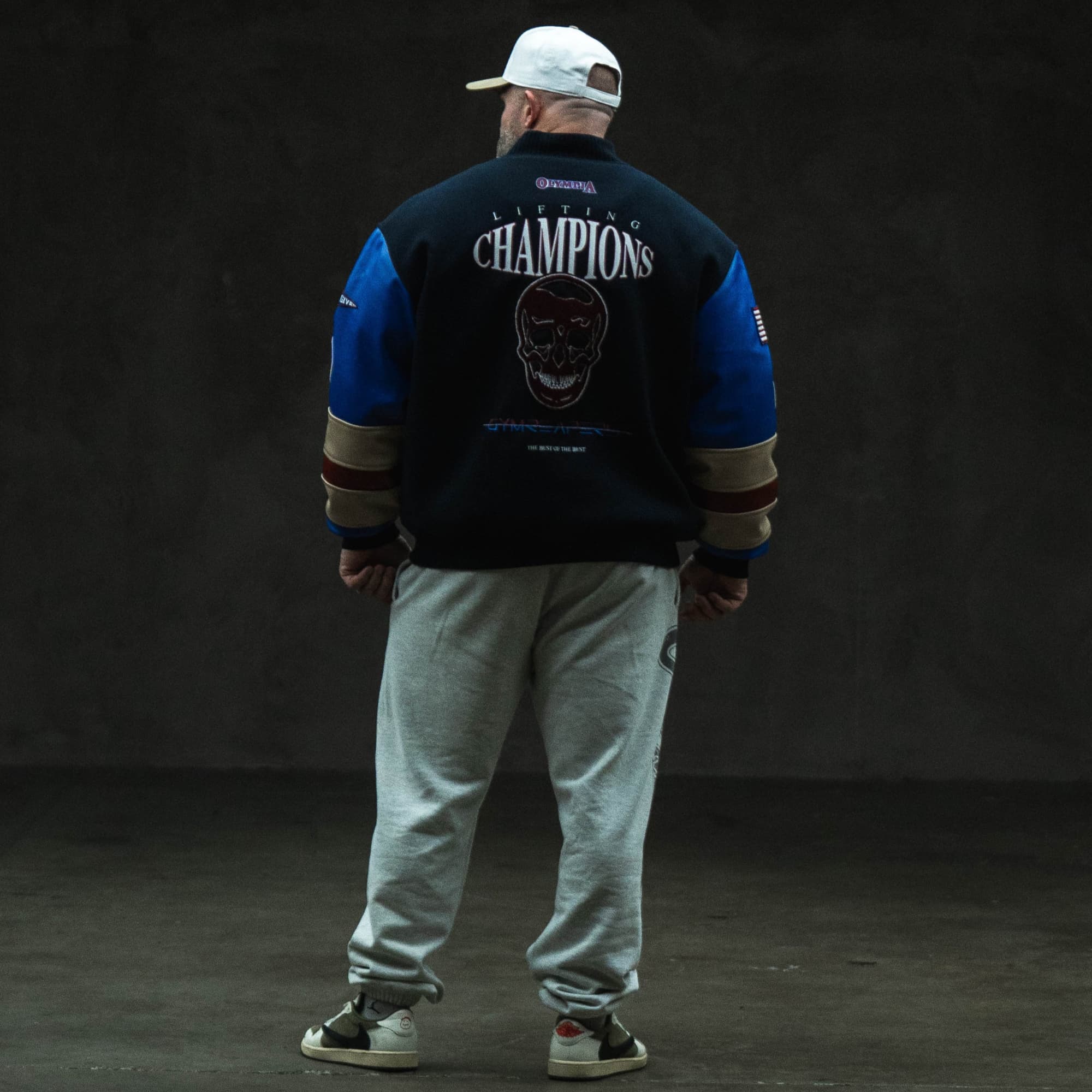 GRxO USA Varsity Jacket on athlete full body shot back view