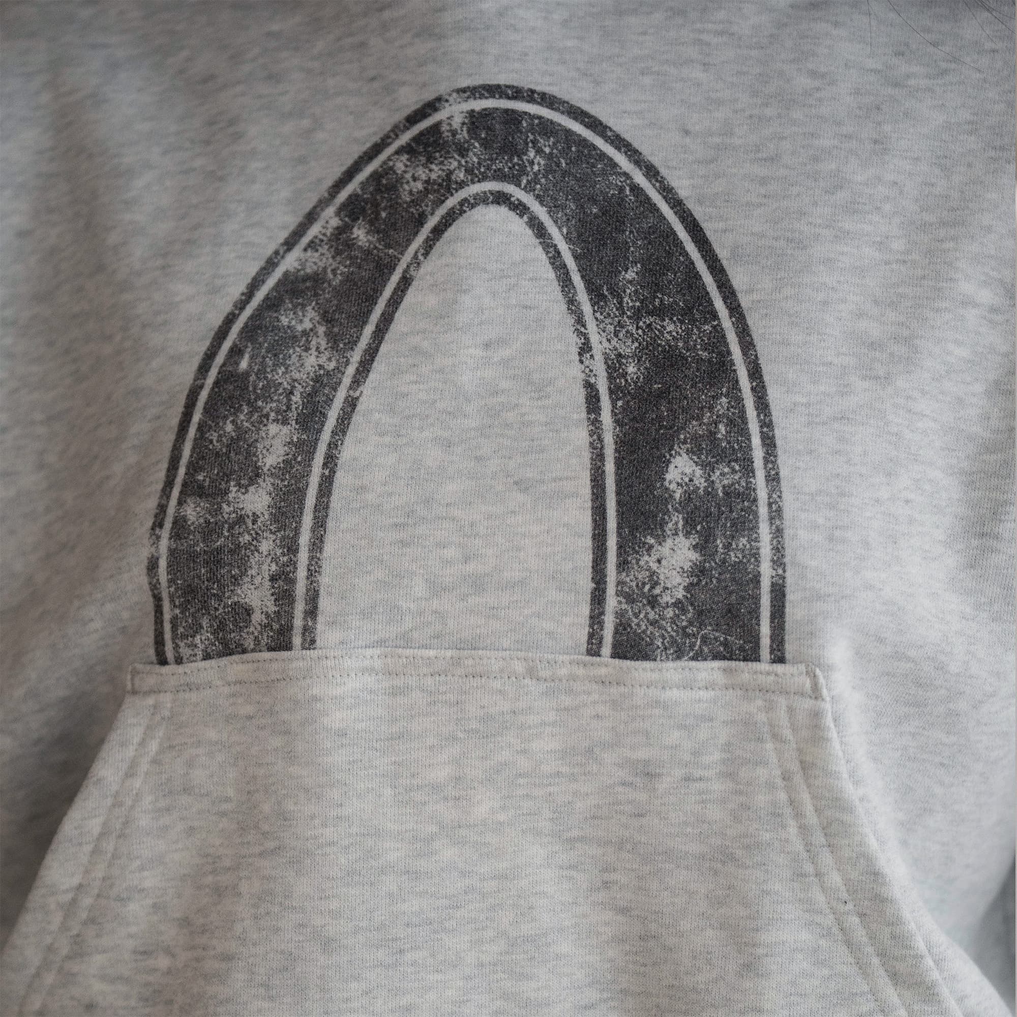 Olympia Cropped Hoodie close up on chest graphic