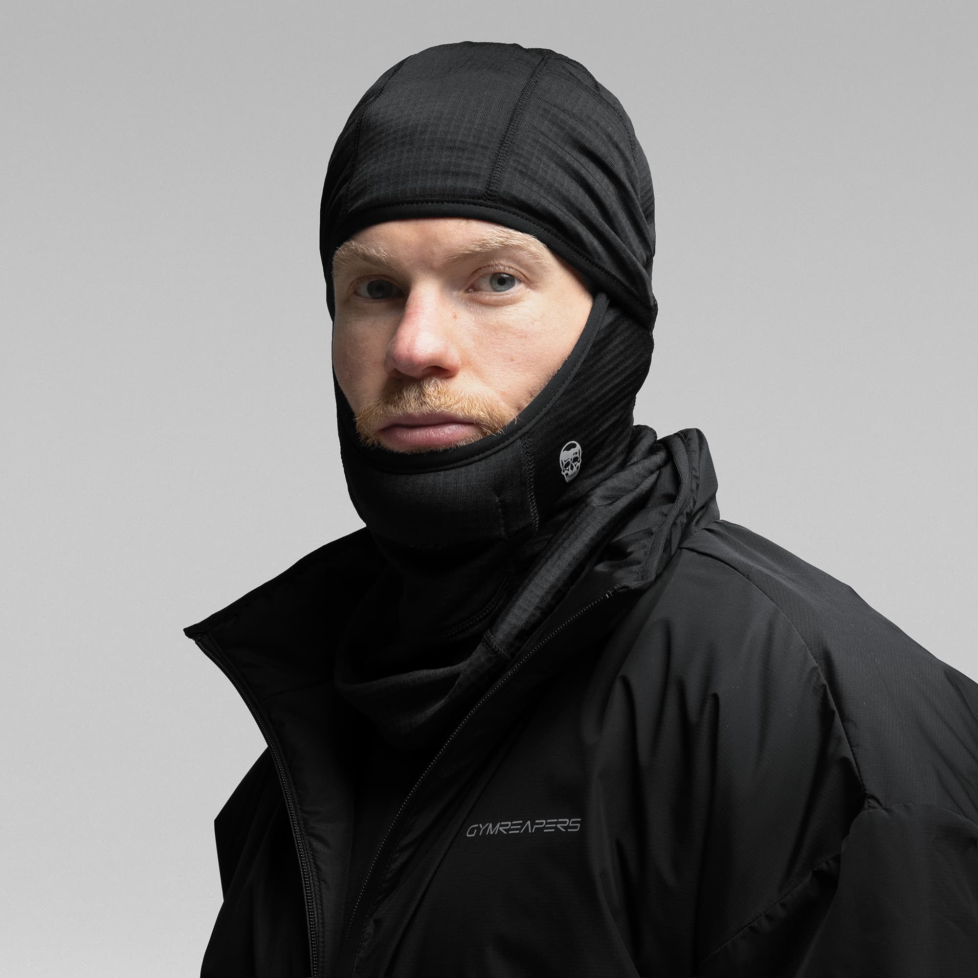 Athlete wearing the Stryda™ Balaclava half face covered