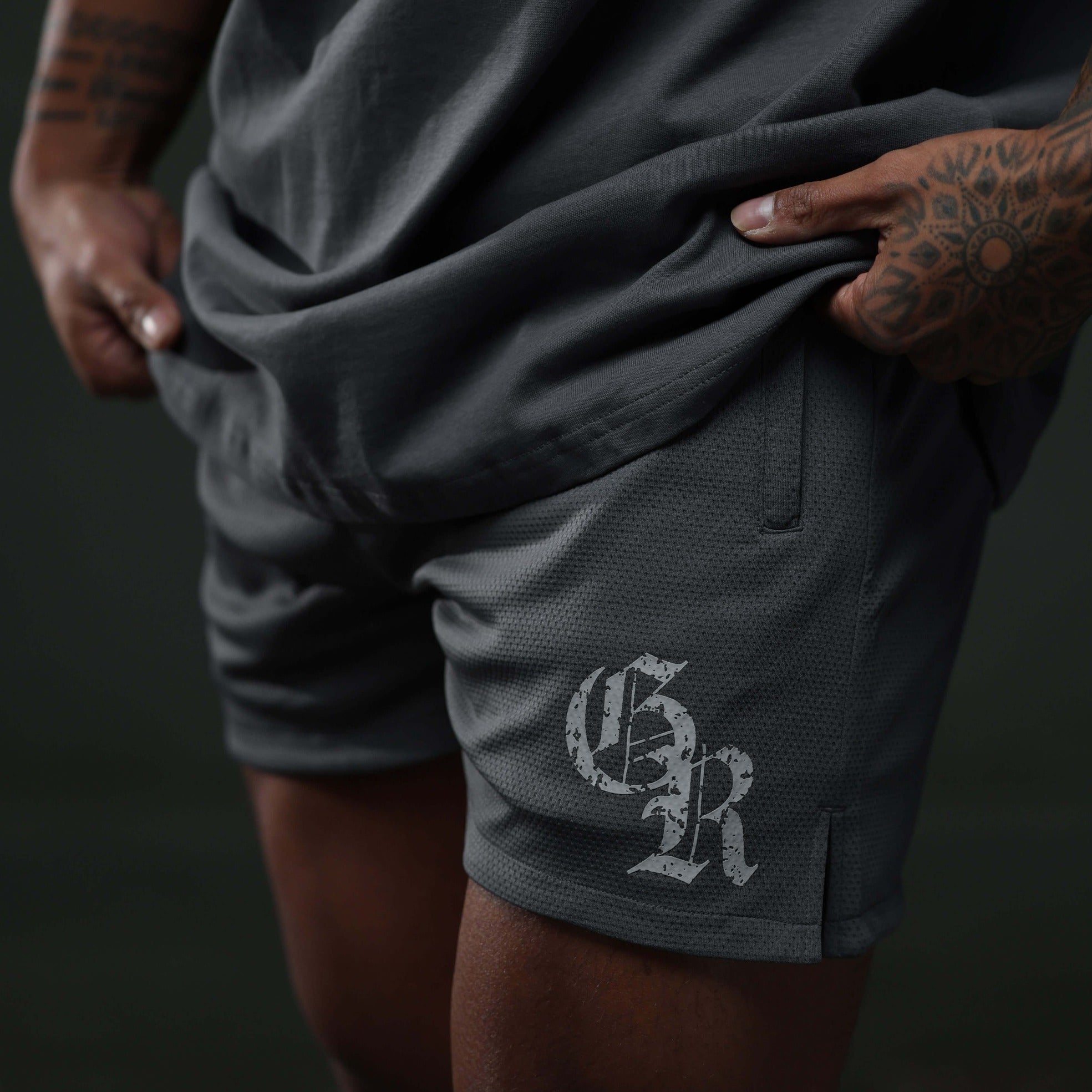 charcoal initial shorts close up