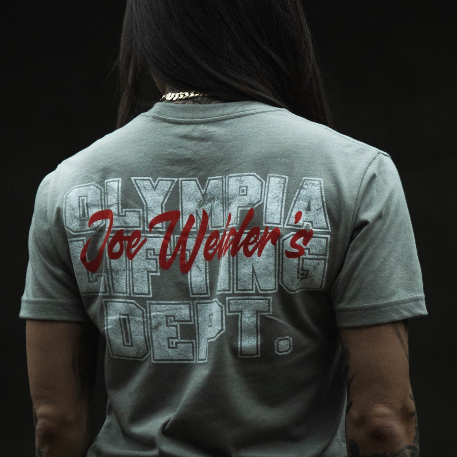 close up shot of athlete wearing the lifting department tee showing back graphic