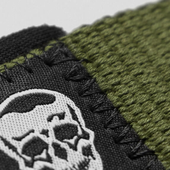 green lifting straps skull close up