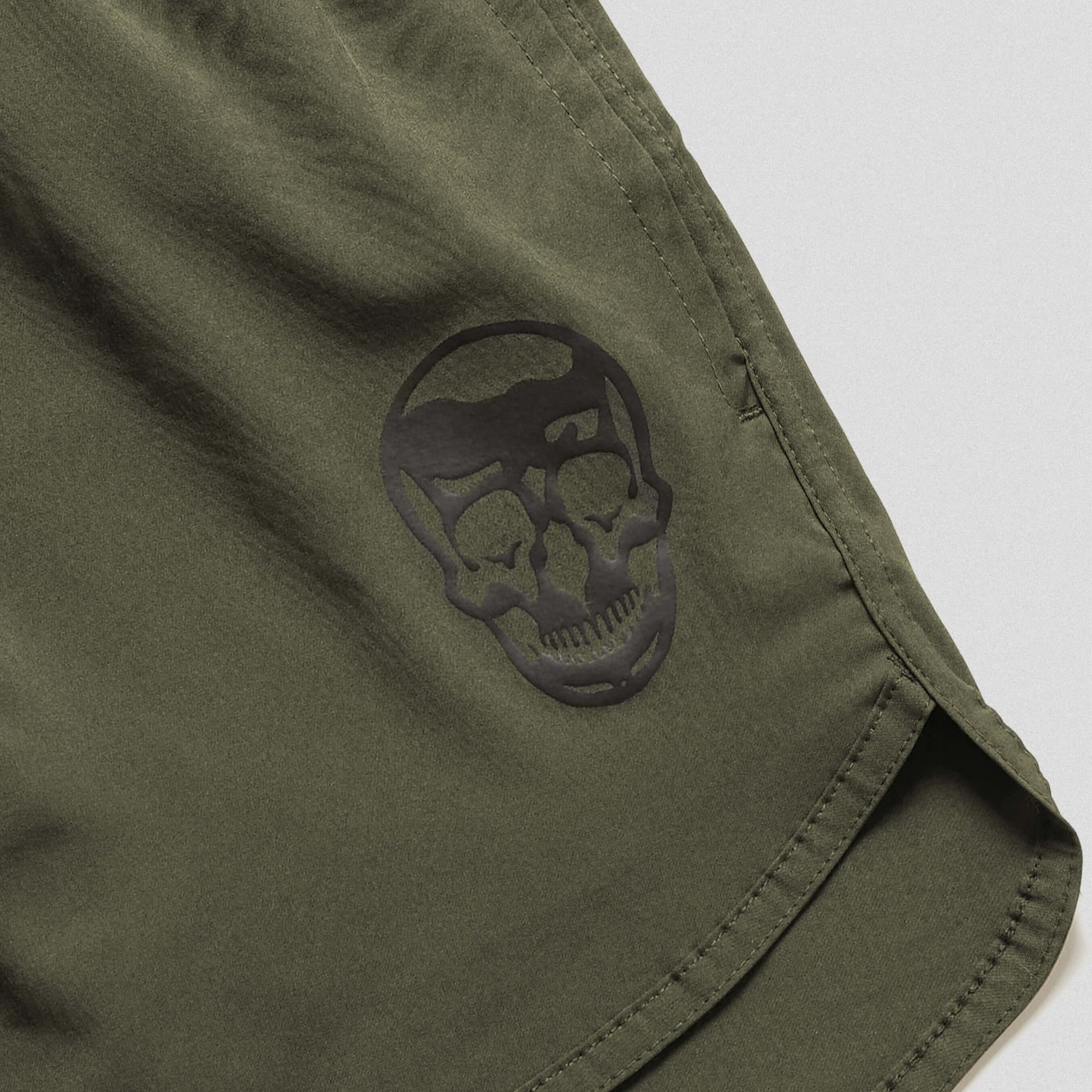 green training shorts close up shot of logo