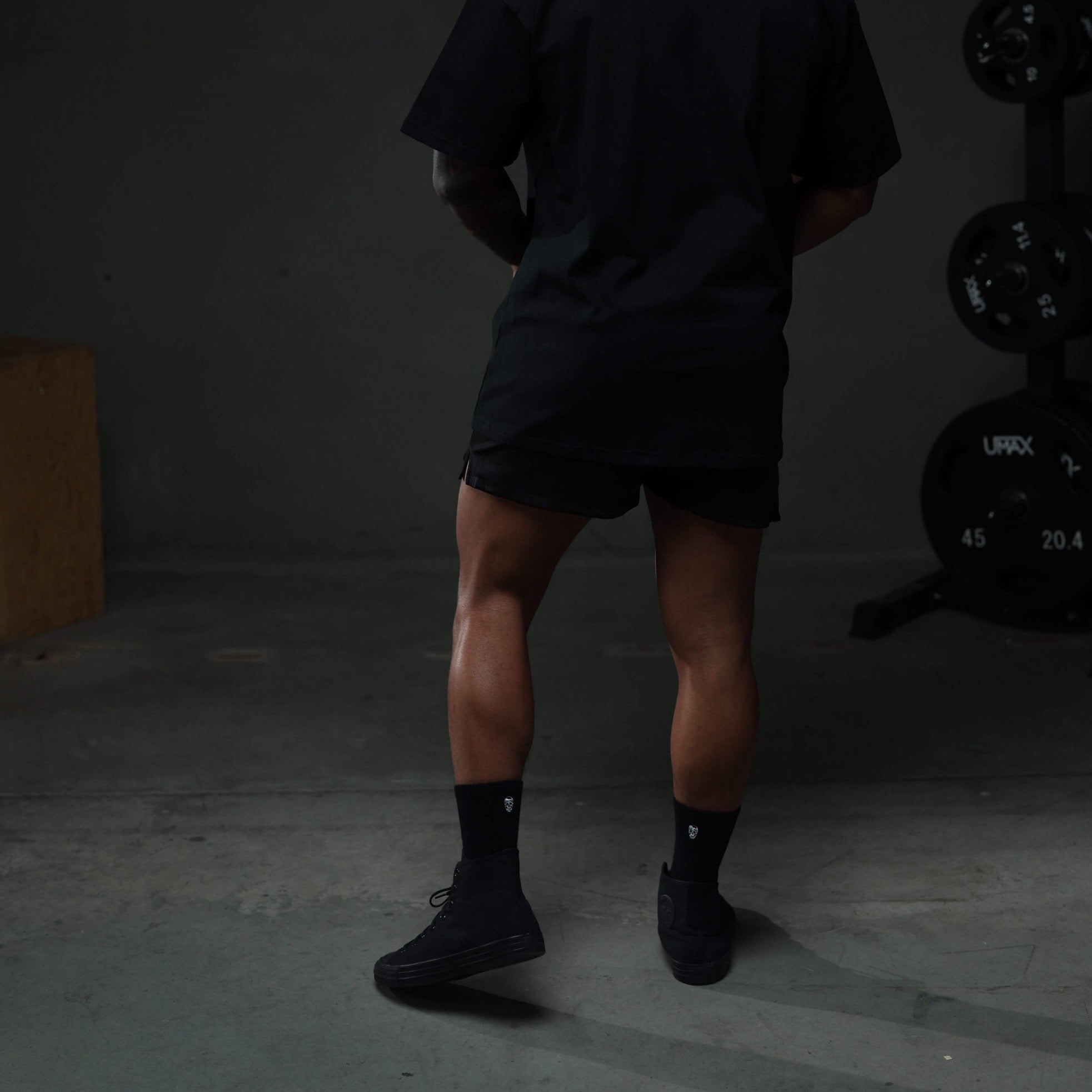 initial shorts black black studio back
