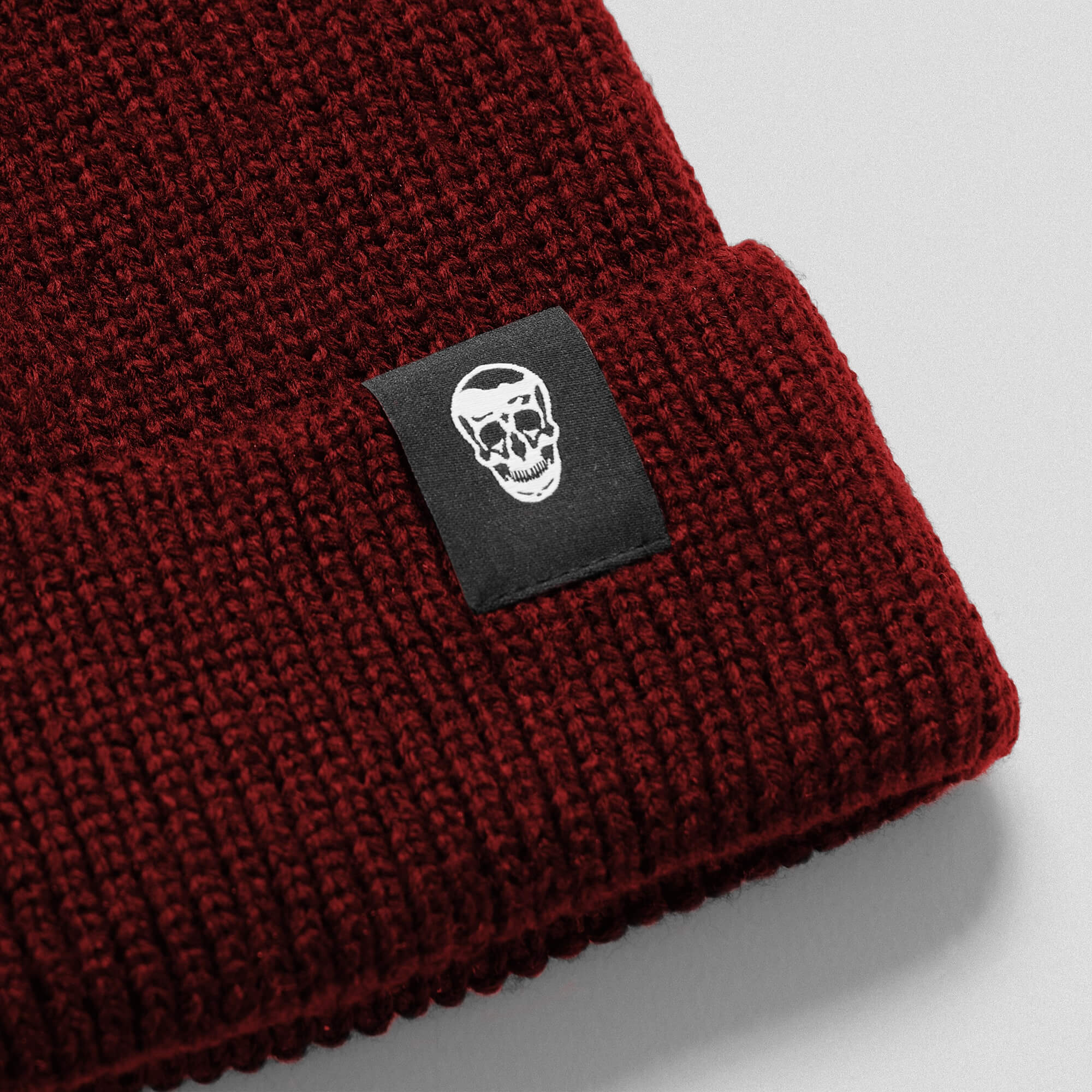 maroon beanie close up