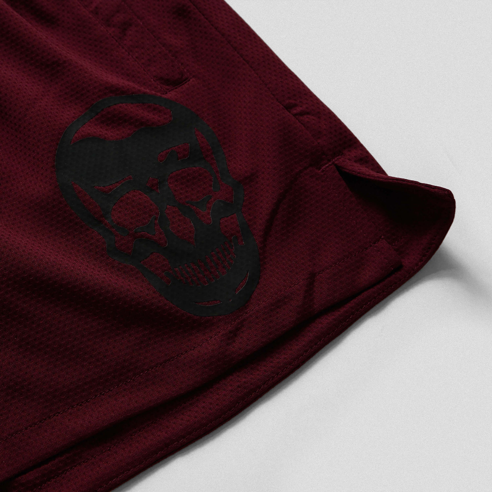 mesh shorts burgundy black skull detail