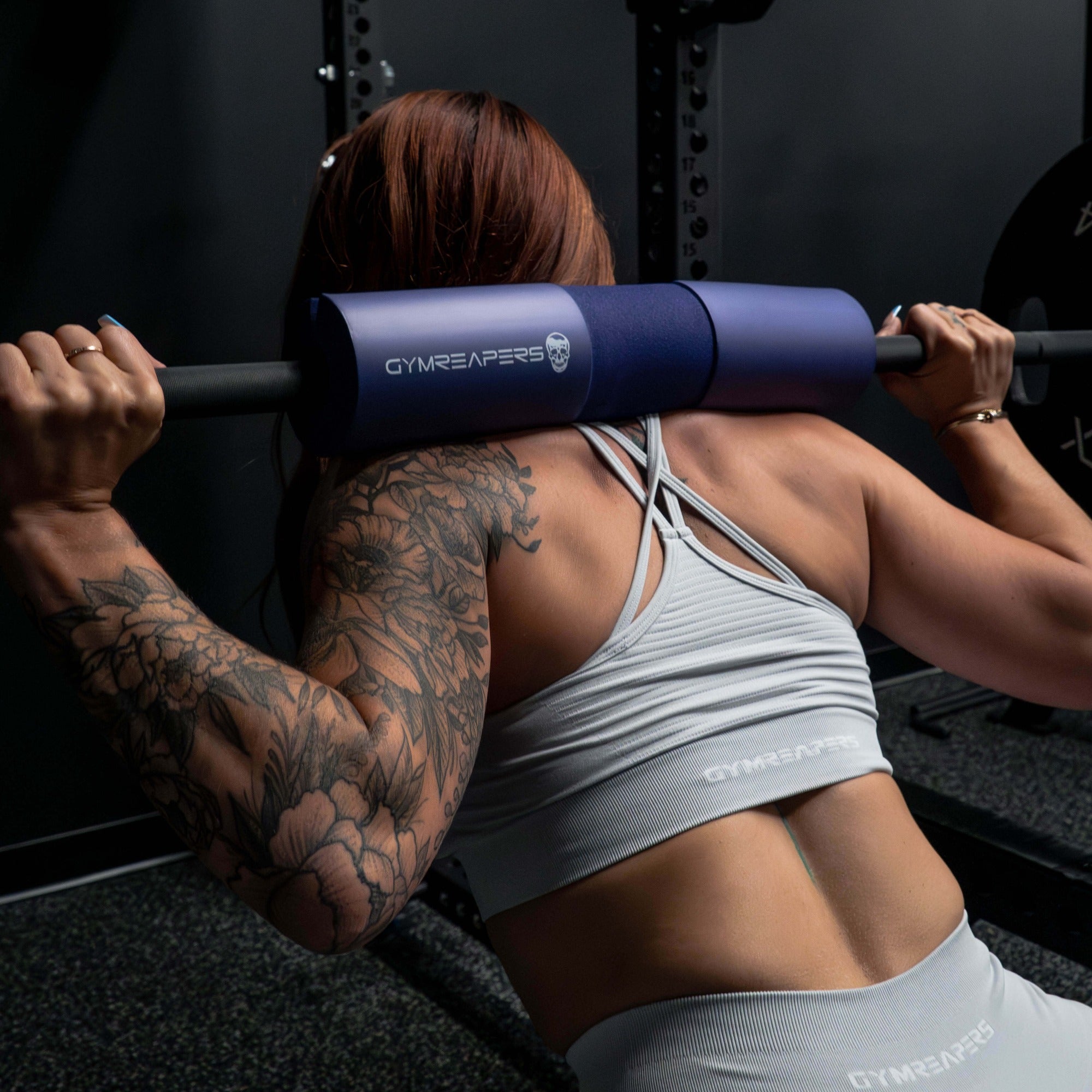 purple barbell pad squat in use