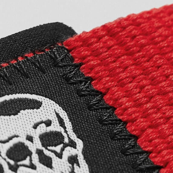 red black lifting straps skull close up