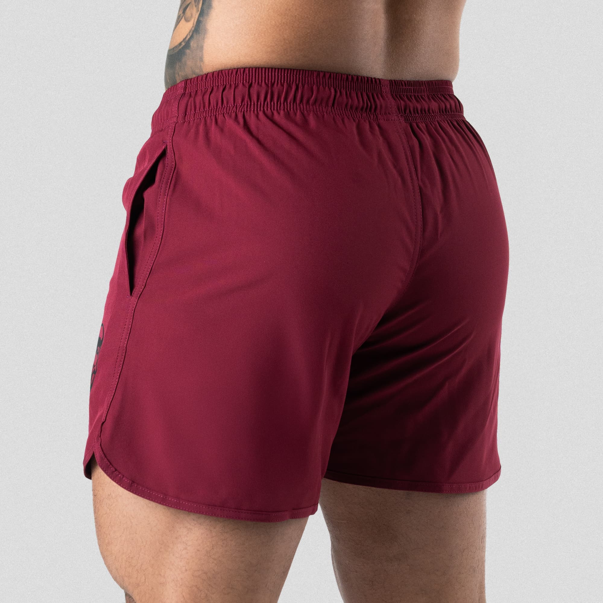 training shorts burgundy back studio