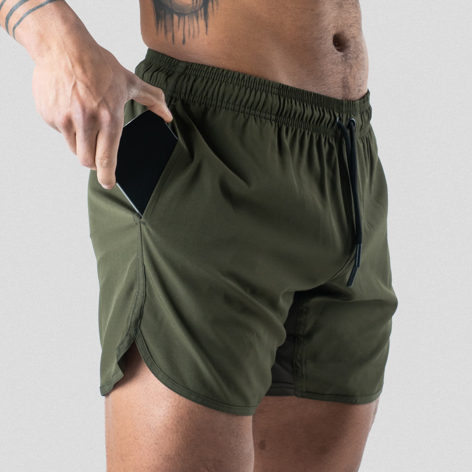 training shorts green pocket studio