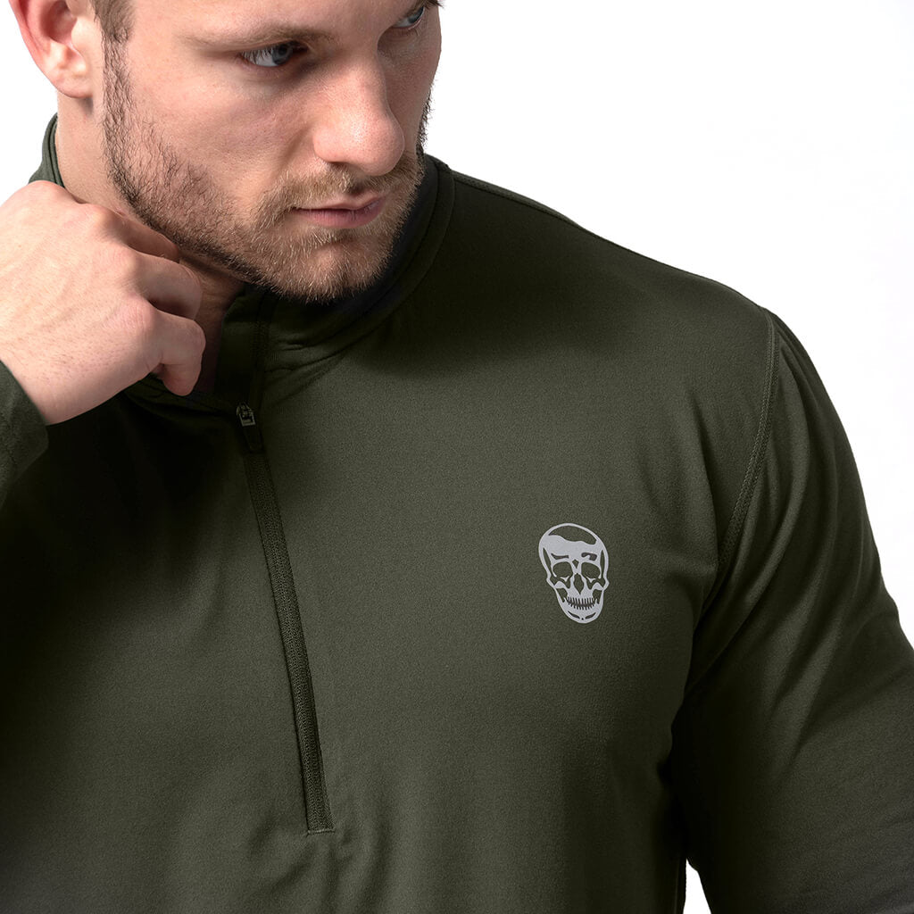 performance 1/4 zip green close up